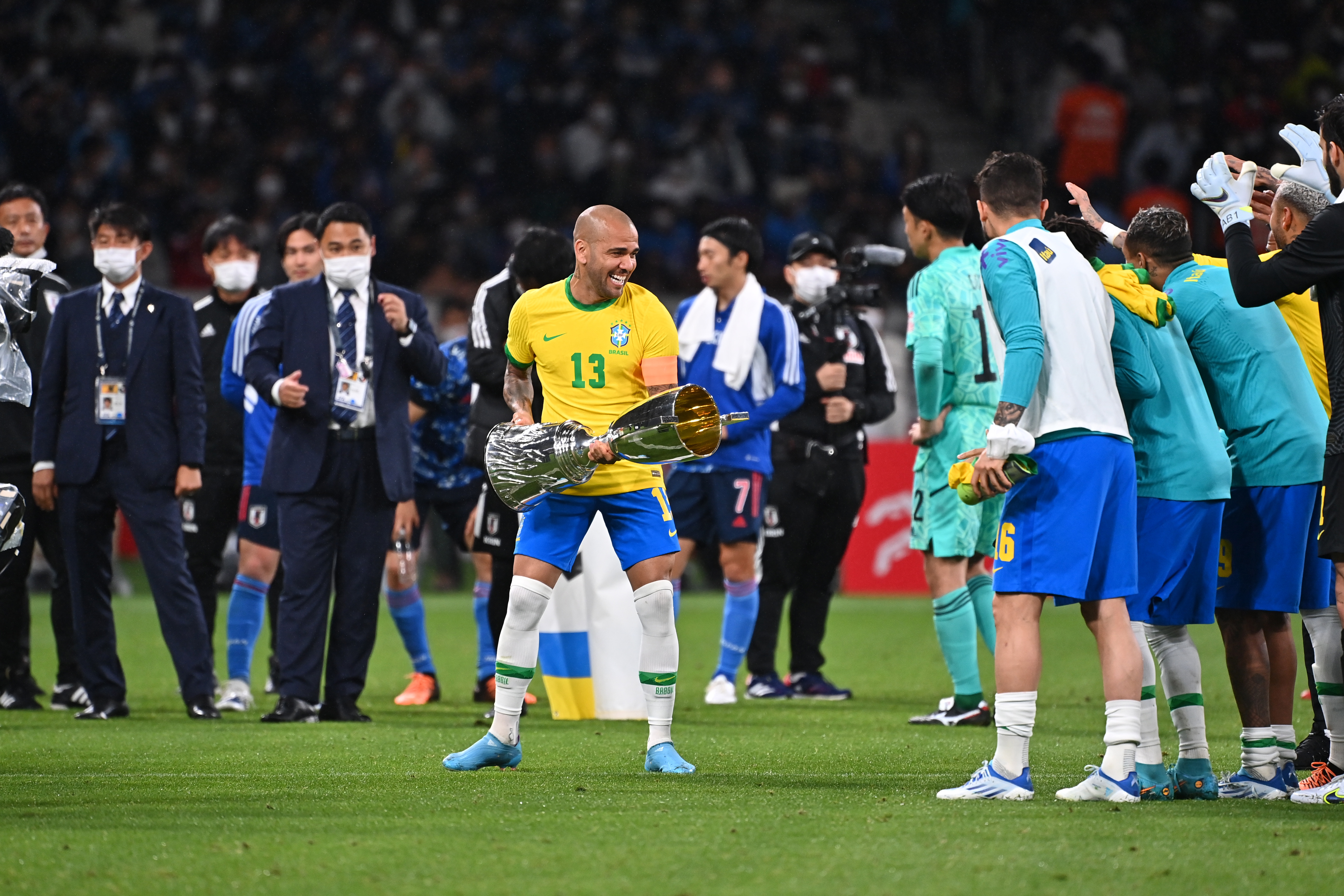 Dani Alves holds the trophy after the international friendly match between Japan and Brazil.