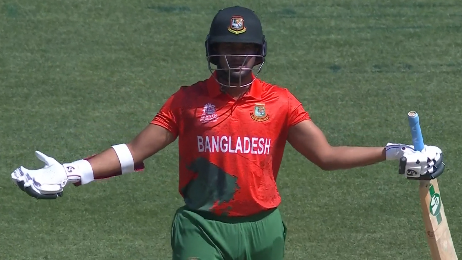 Shakib Al Hasan raises his hands in disgust after being given out.