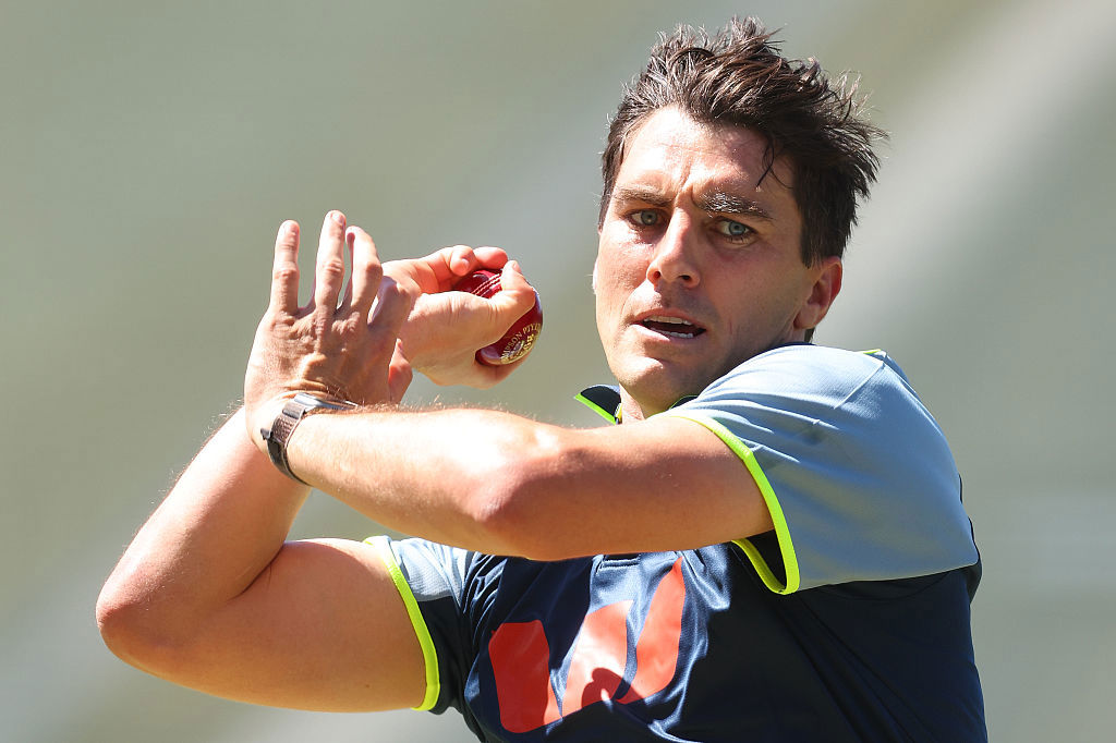 Pat Cummins bowls in the nets.