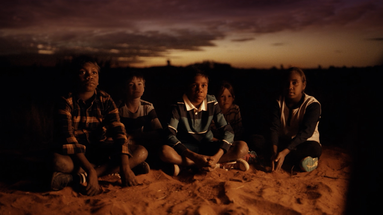 One child asks "is that story true" in response the yarn told by Trevor Jamieson.