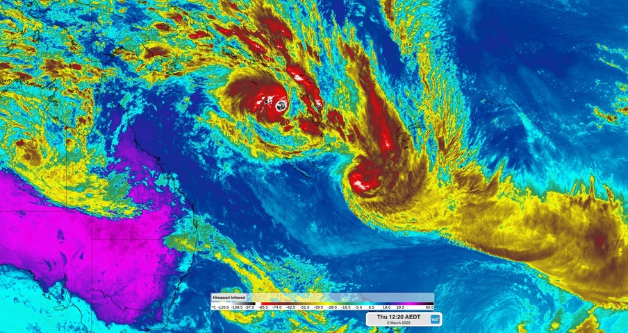 Two tropical cyclones are swirling off Queensland's coast and are expected to follow similar paths.