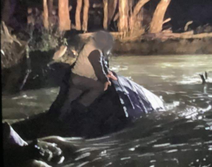 Two men have been rescued after driving into floodwater they thought was "large puddle" near Shepparton.