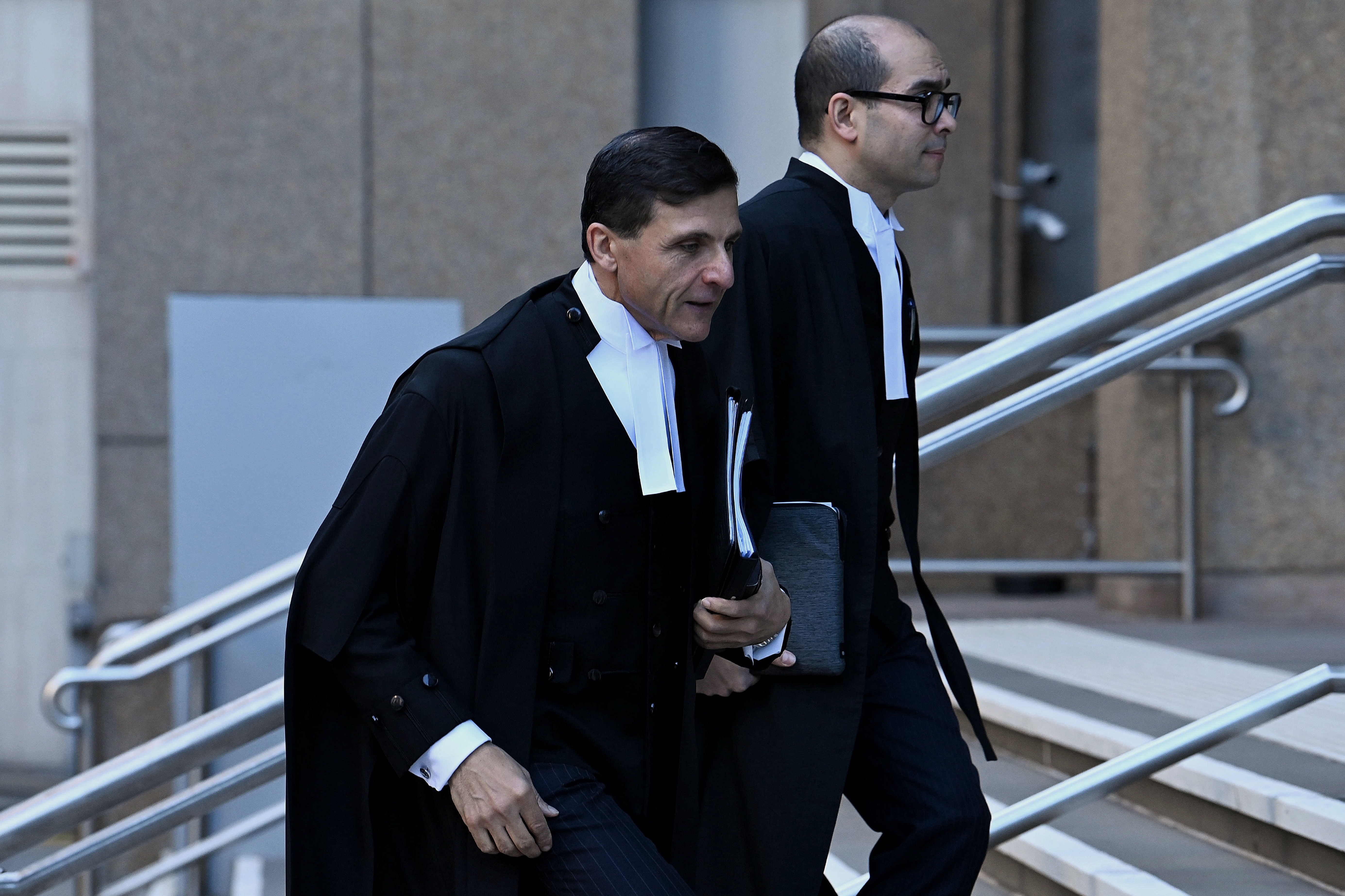 Arthur Moses (left) the Barrister for Ben Roberts-Smith arrives at the NSW Supreme Courts this morning in Sydney. 18th July, 2022. Photo: Kate Geraghty
