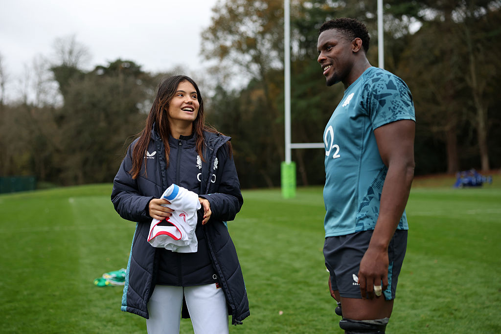 British tennis player Emma Raducanu talks with Maro Itoje of England.
