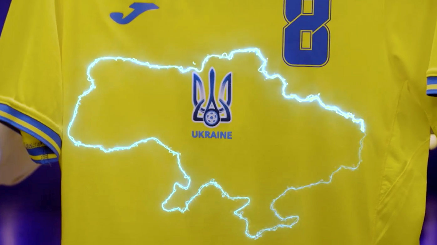 This handout photo taken from a video released by President of Ukrainian Association of Football Andrii Pavel Pavelko via Facebook, shows a new Ukraine's uniform for Ukrainian national soccer team that lights showing a map of Ukraine including Russian-annexed Crimea, Ukraine, Monday, June 7, 2021. RP)