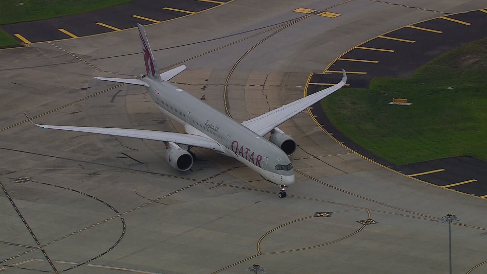 A Qatar flight touches down at Melbourne Airport at about 4.30pm.