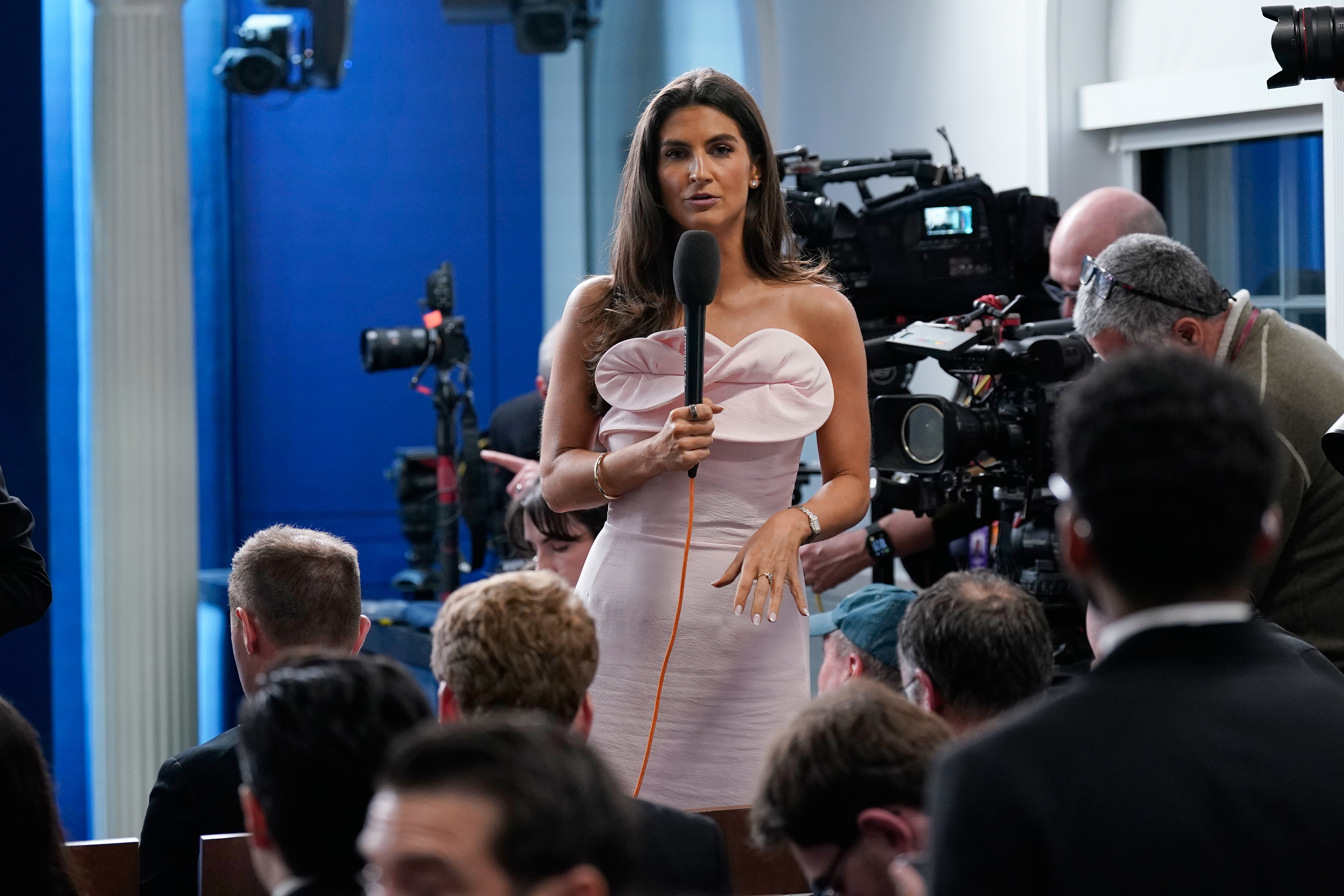CNN's Kaitlan Collins does a report before President Donald Trump speaks in the James Brady Press Briefing Room at the White House after an unspecified threat at the annual White House Correspondents' Association Dinner in Washington, Saturday, April 25, 2026. (AP Photo/Jose Luis Magana)