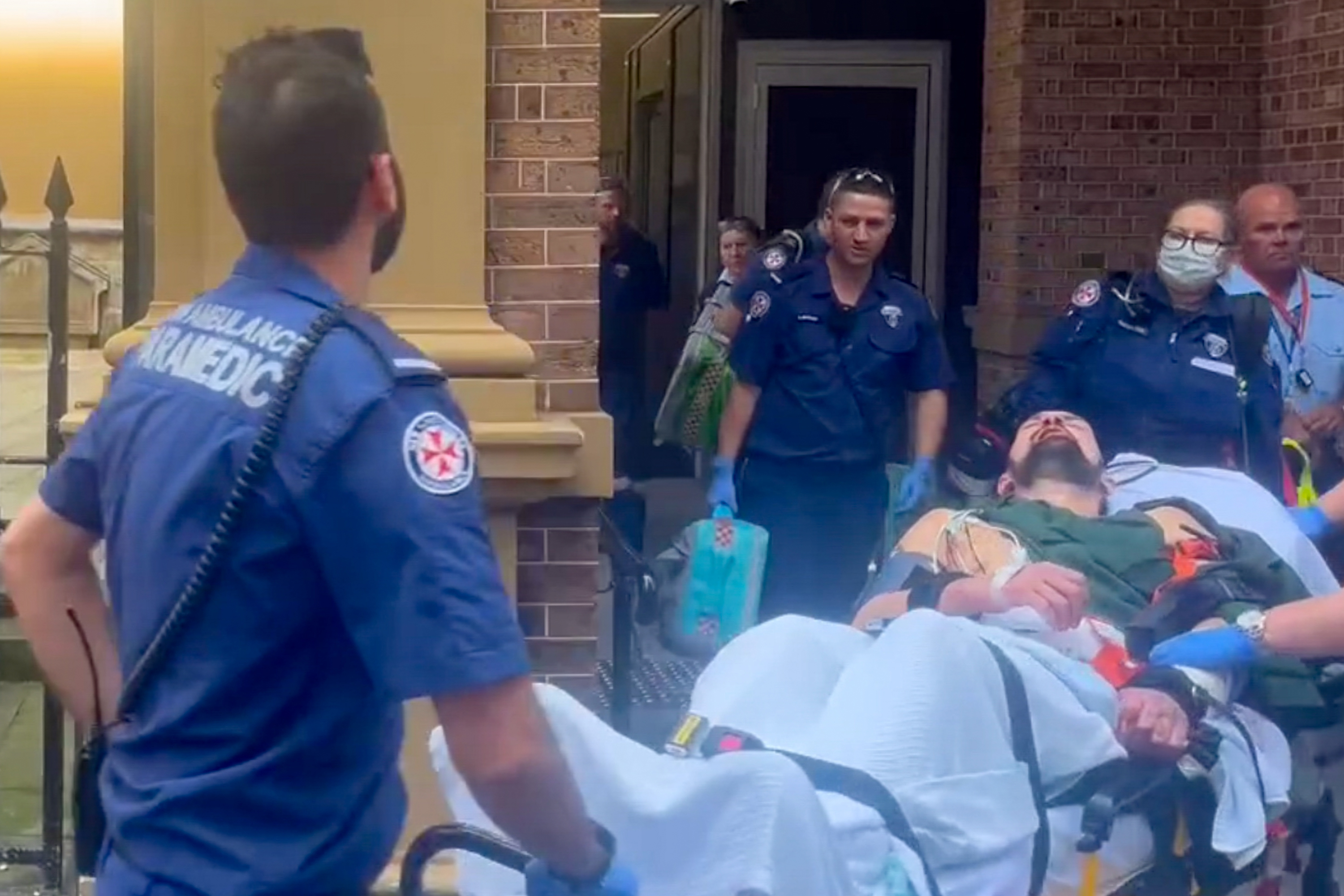 Paul Jason Sultana was rushed out of court on a stretcher tended by paramedics.