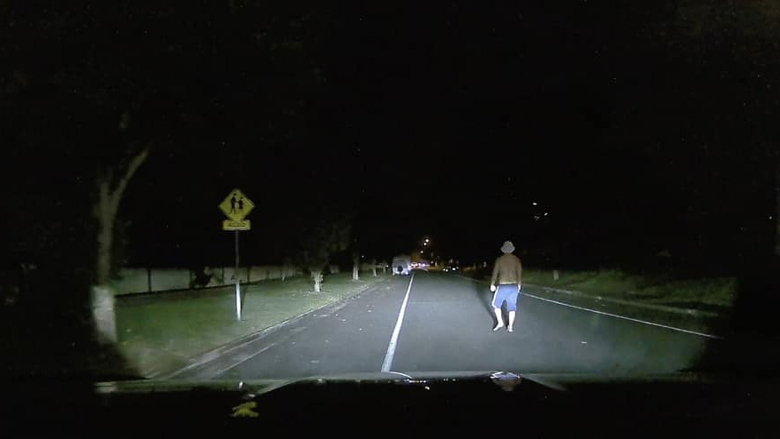 The man can be seen in the dashcam footage walking down Freeth St West, in Ormiston.