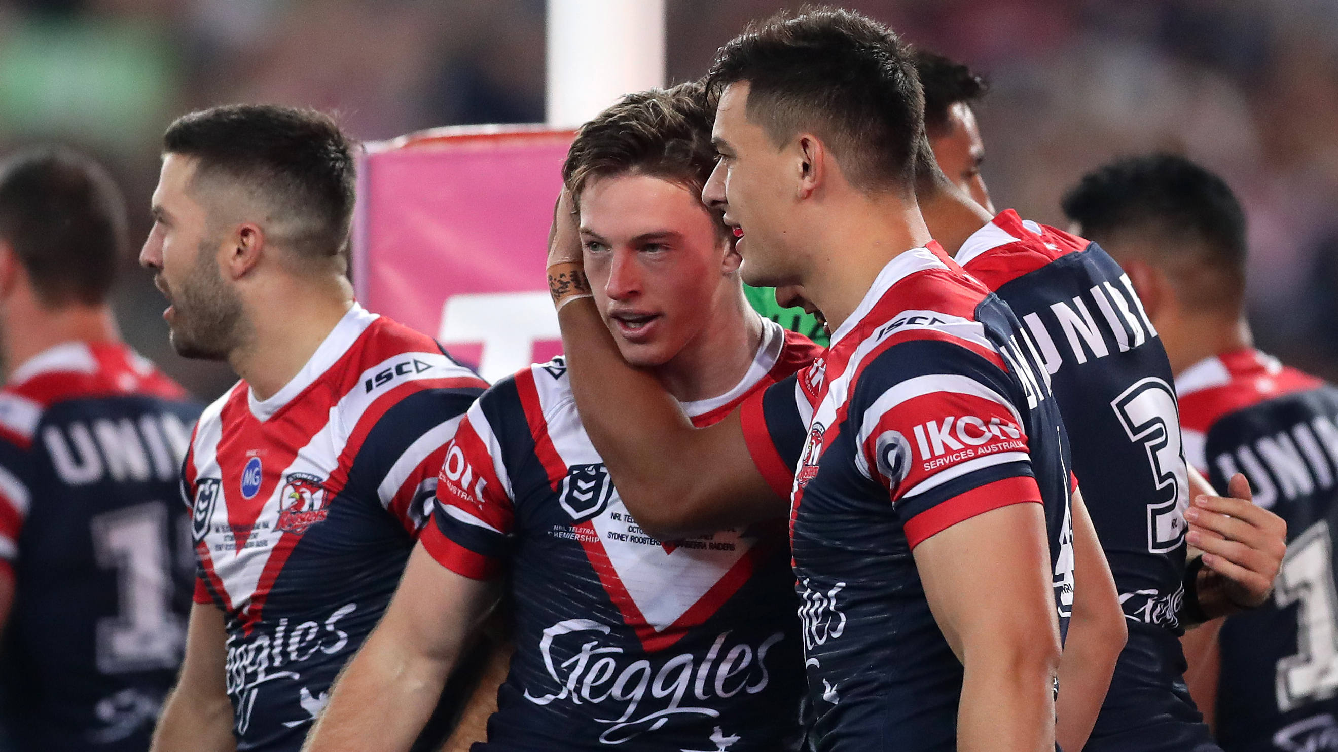 Roosters hooker Sam Verrills is congratulated for a try.