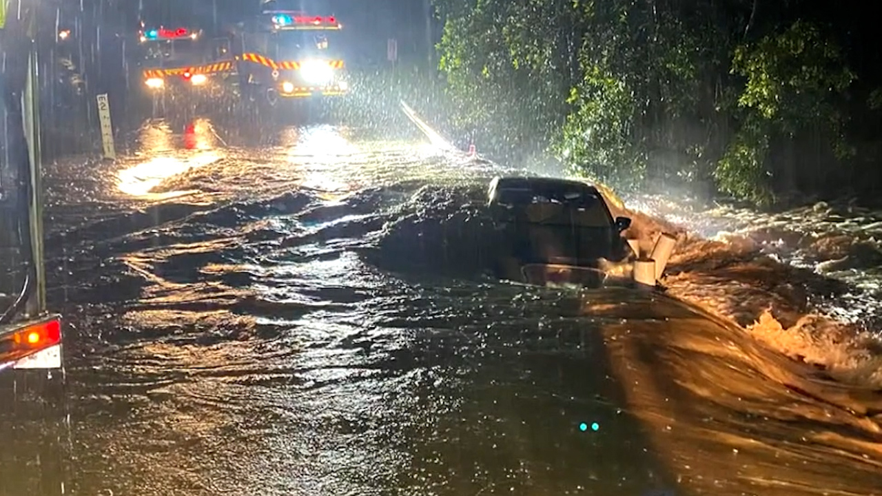 Near Wollongong, the local pizza delivery car dragged out - drenched.