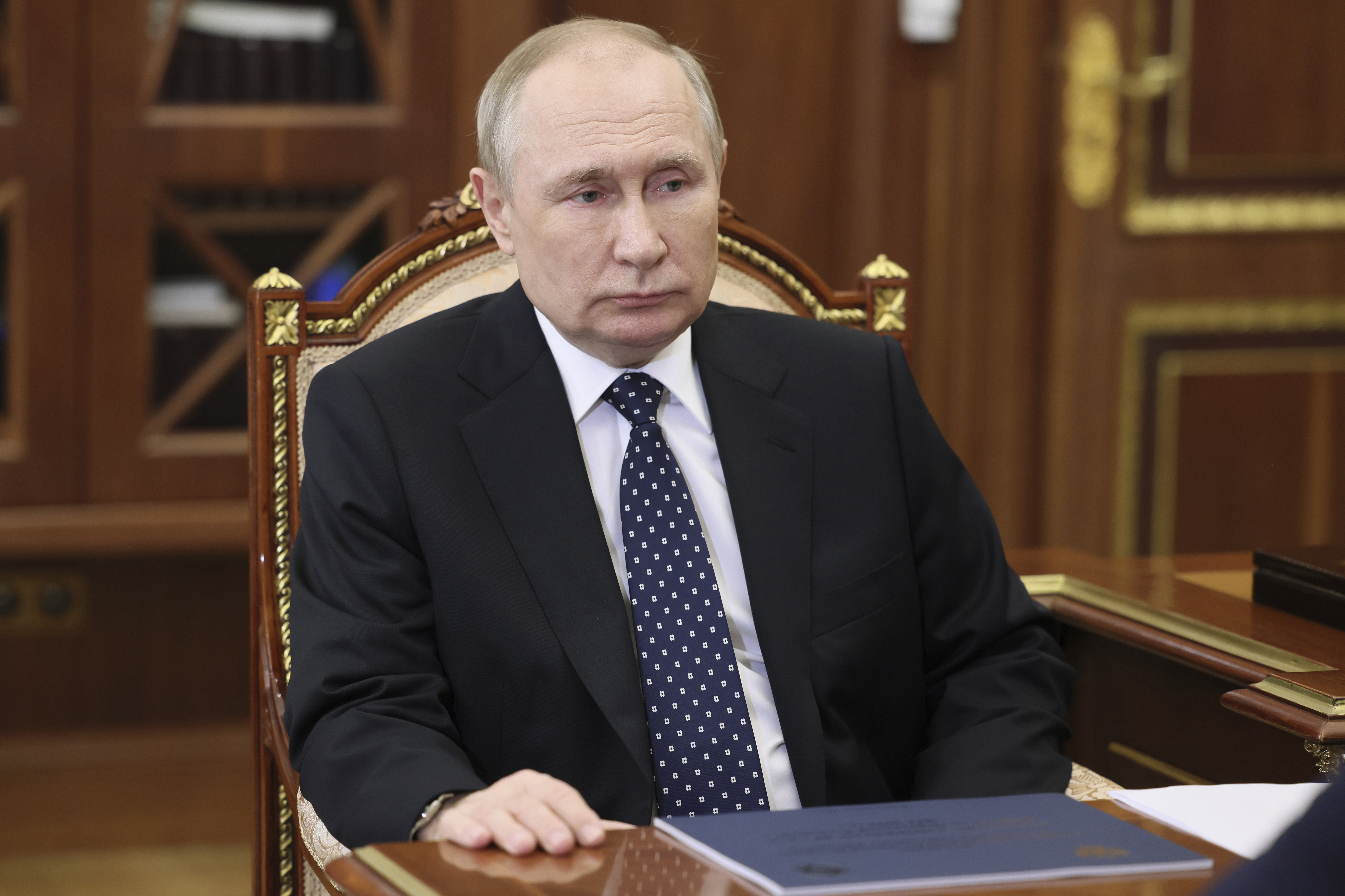 Russian President Vladimir Putin attends a meeting in Moscow, Russia, Thursday, Jan. 5, 2023. (Mikhail Klimentyev, Sputnik, Kremlin Pool Photo via AP)