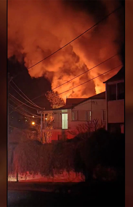 Neighbours rushed to the elderly siblings who were trapped inside a burning Brisbane home.