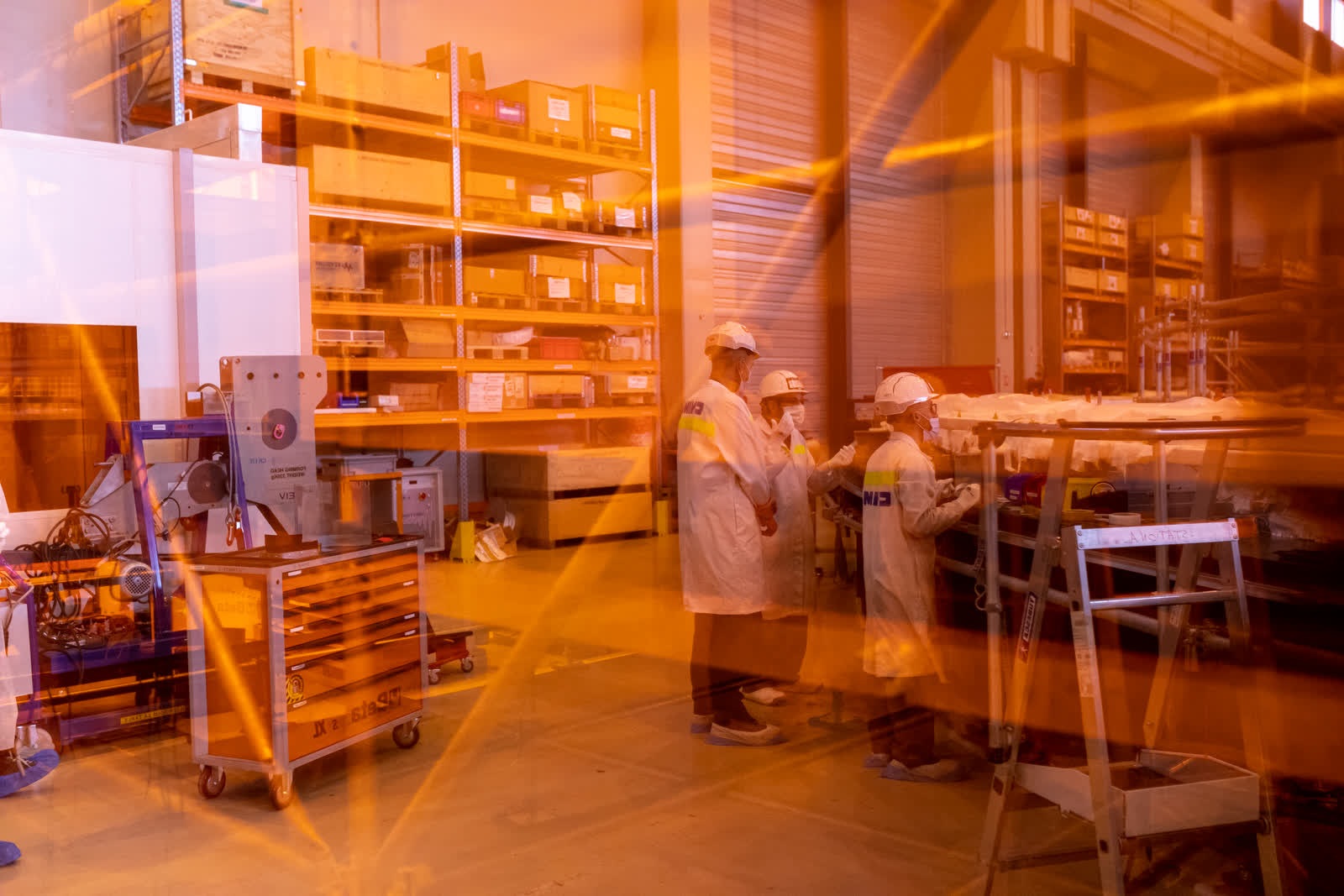 Workers inspecting superconductors at ITER.