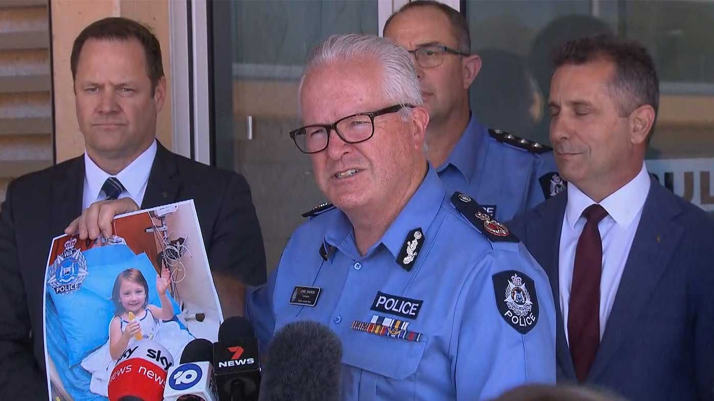 WA Police Commissioner Chris Dawson holds up a photo of Cleo Smith.