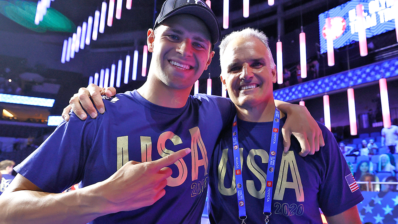 Michael Andrew of the United States and coach Peter Andrew 