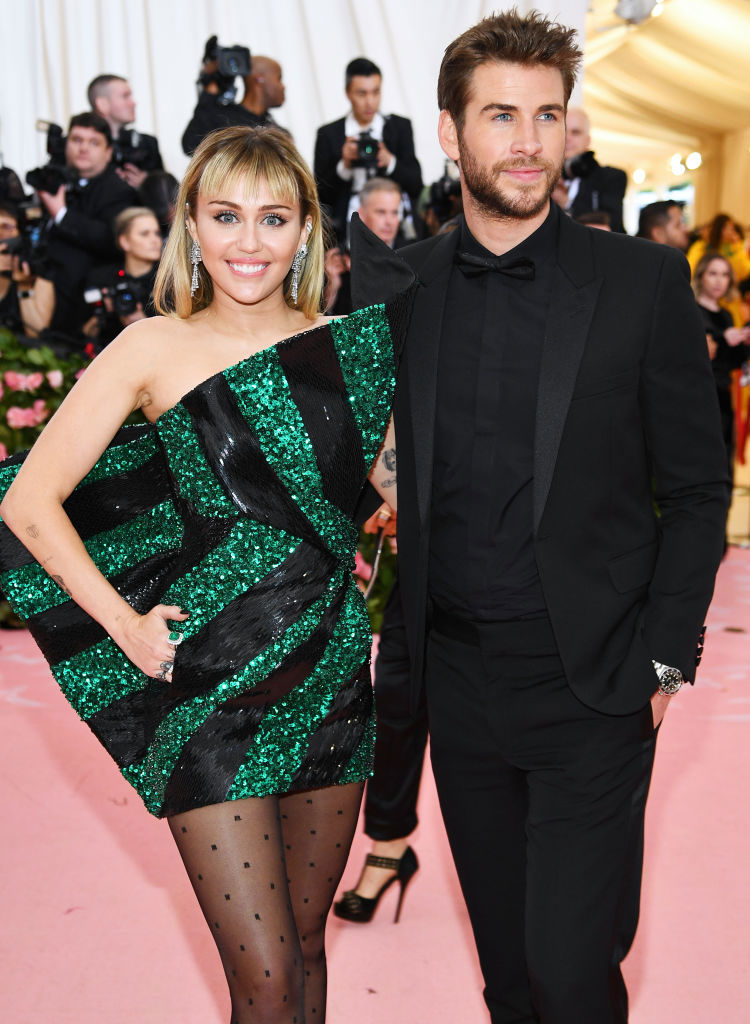 NEW YORK, NEW YORK - MAY 06: Miley Cyrus and Liam Hemsworth attend The 2019 Met Gala Celebrating Camp: Notes on Fashion at Metropolitan Museum of Art on May 06, 2019 in New York City. (Photo by Dimitrios Kambouris/Getty Images for The Met Museum/Vogue)