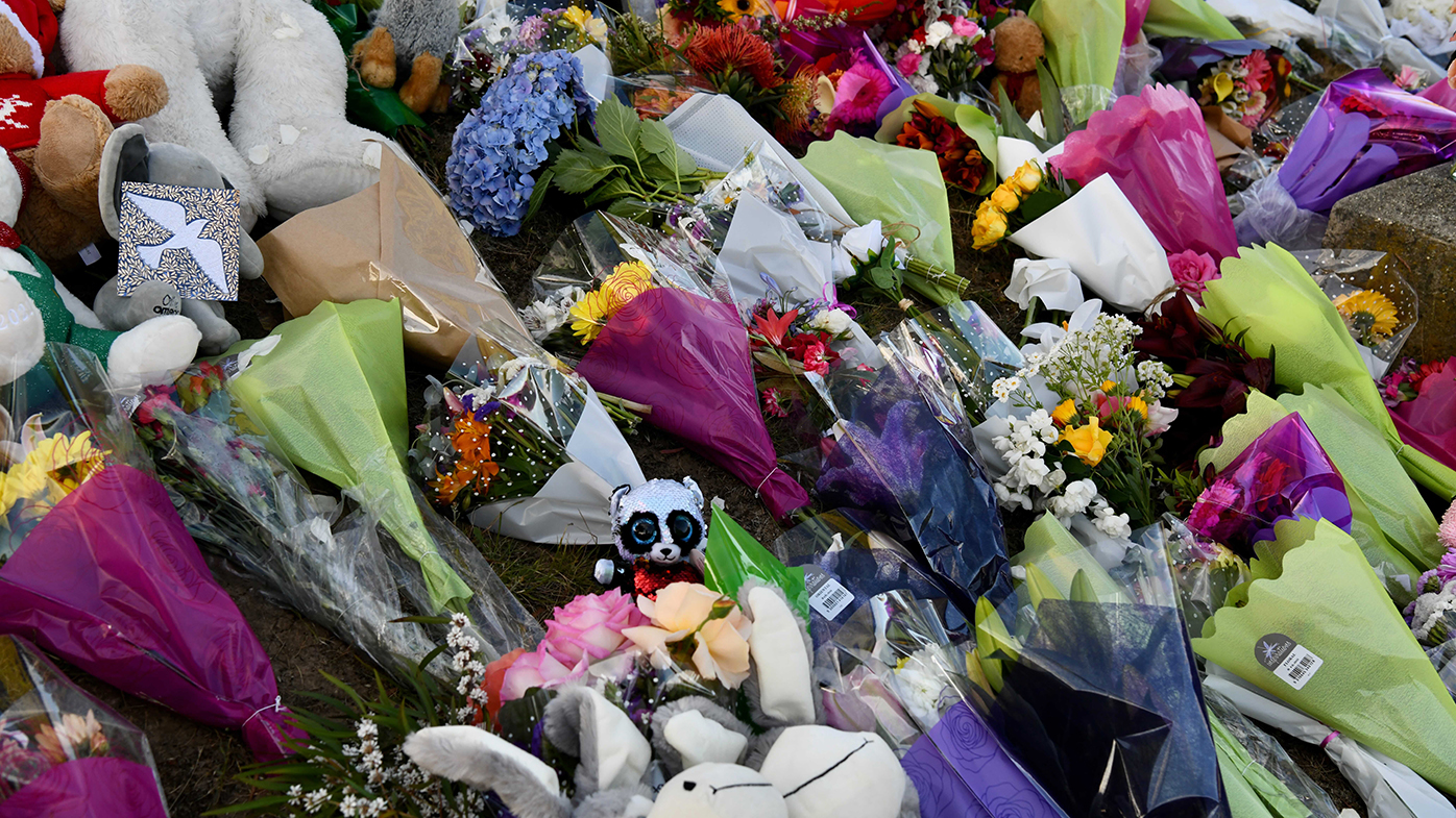 Tributes for the children killed have been laid outside the Devonport school. 