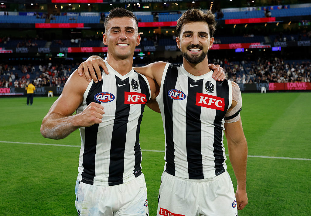 Nick Daicos (left) and brother Josh Daicos celebrate after a game together.
