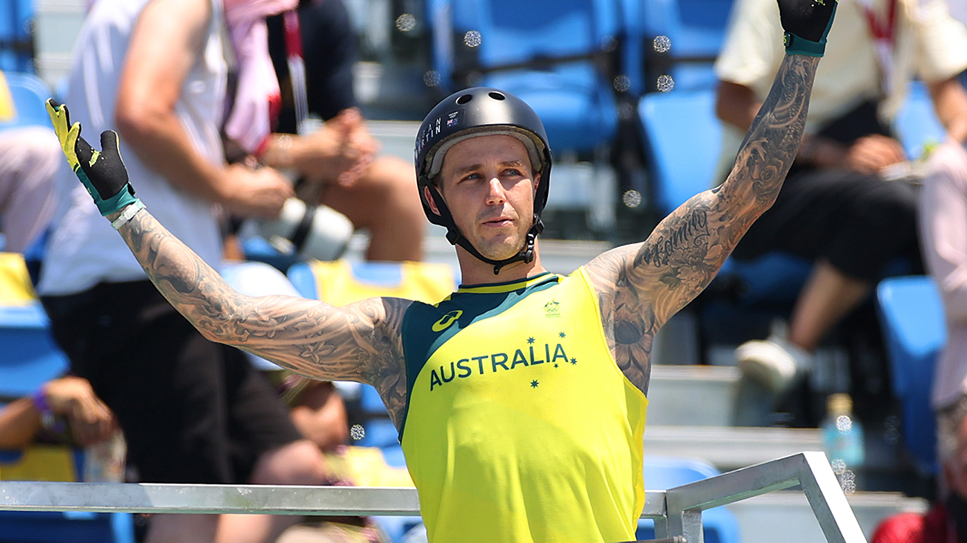 Logan Martin celebrates winning gold at Tokyo