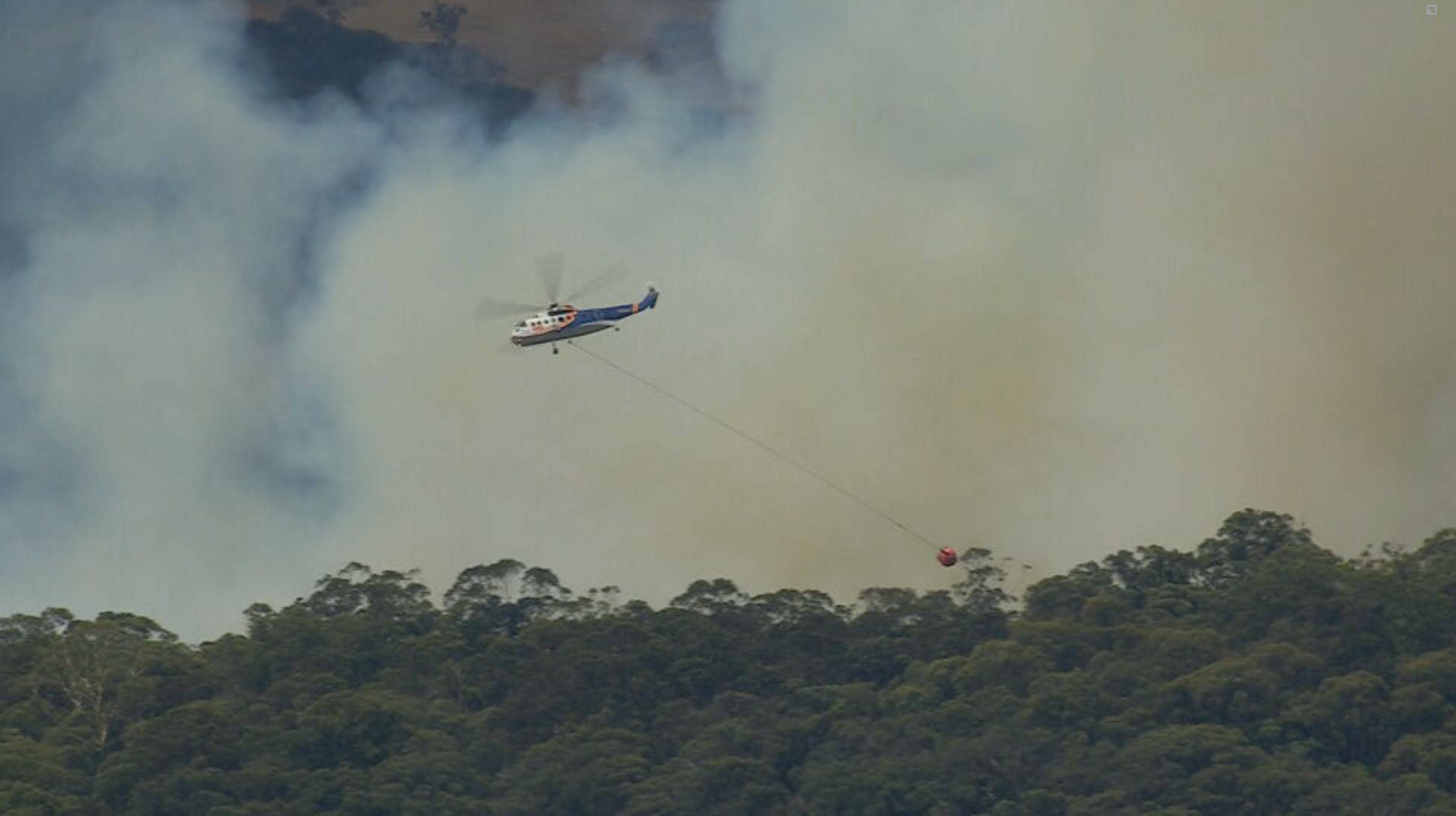 Bushfire in central Victoria downgraded after wind change pushes flames east 