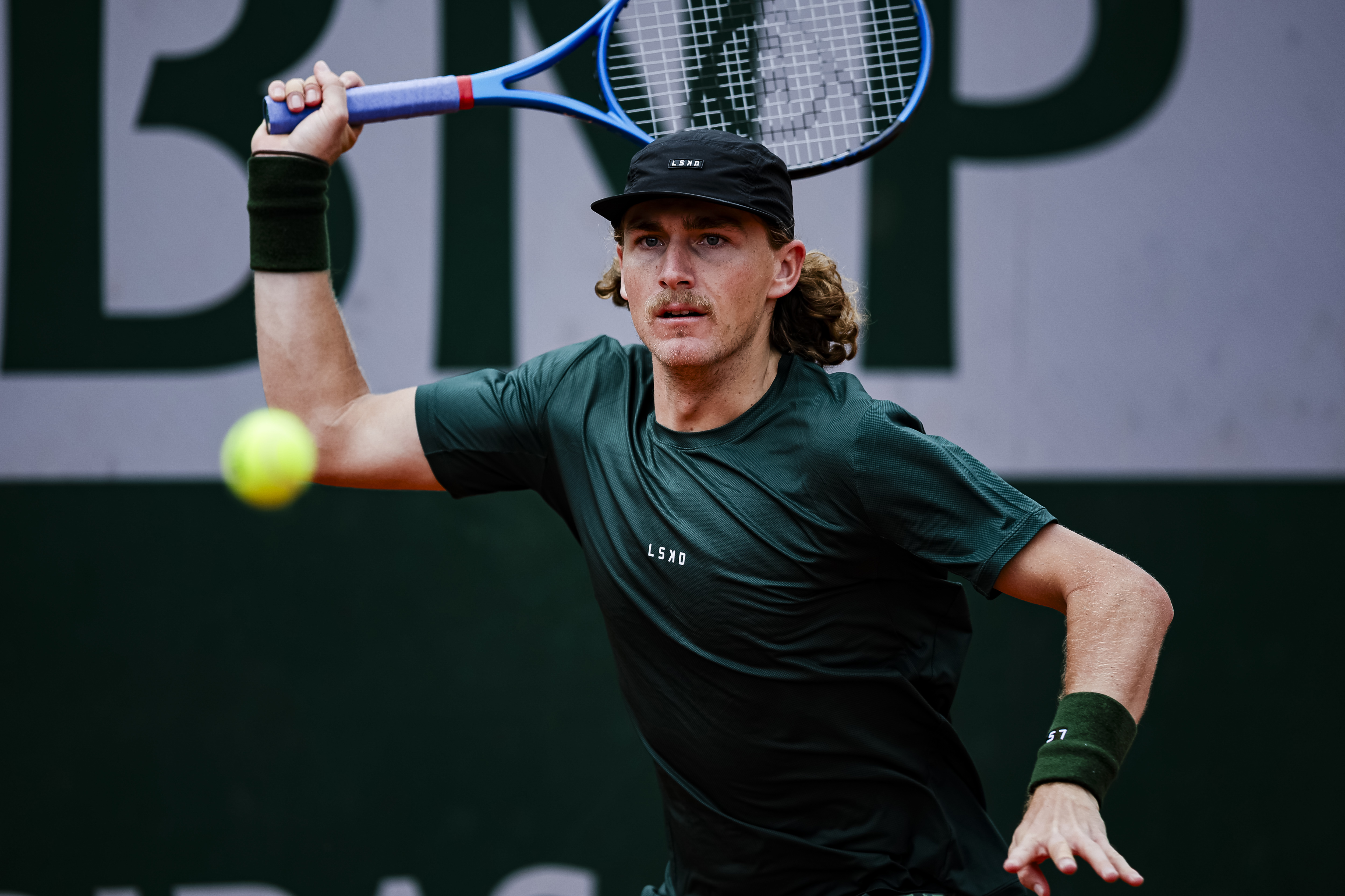 Max Purcell of Australia plays a forehand against Henri Squire of Germany during 2024 French Open - Day 2 at Roland Garros on May 27, 2024 in Paris, France. (Photo by Antonio Borga/Eurasia Sport Images/Getty Images)