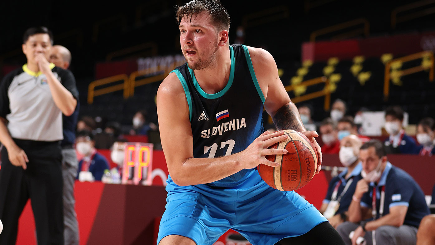  Luka Doncic #77 of Team Slovenia is drops back to shoot a three point basket against Argentina during the second half on day three of the Tokyo 2020 Olympic Games at Saitama Super Arena on July 26, 2021 in Saitama, Japan. (Photo by Gregory Shamus/Getty I
