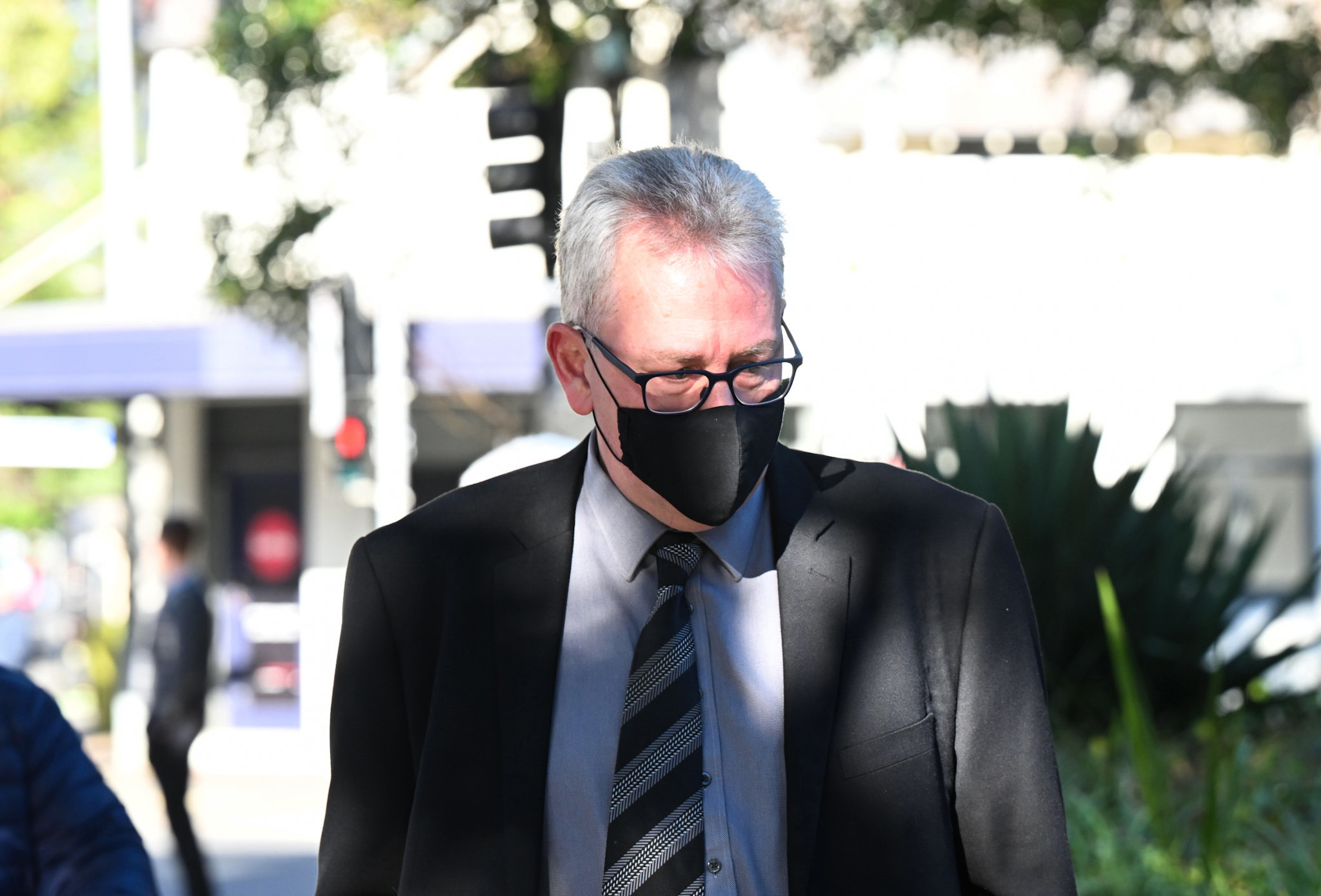 Former deputy principal Damian Wanstall arrives at the Parramatta District Court to be sentenced for using a carriage service to procure a child under 16 for sexual activity, in Sydney. July 25, 2023