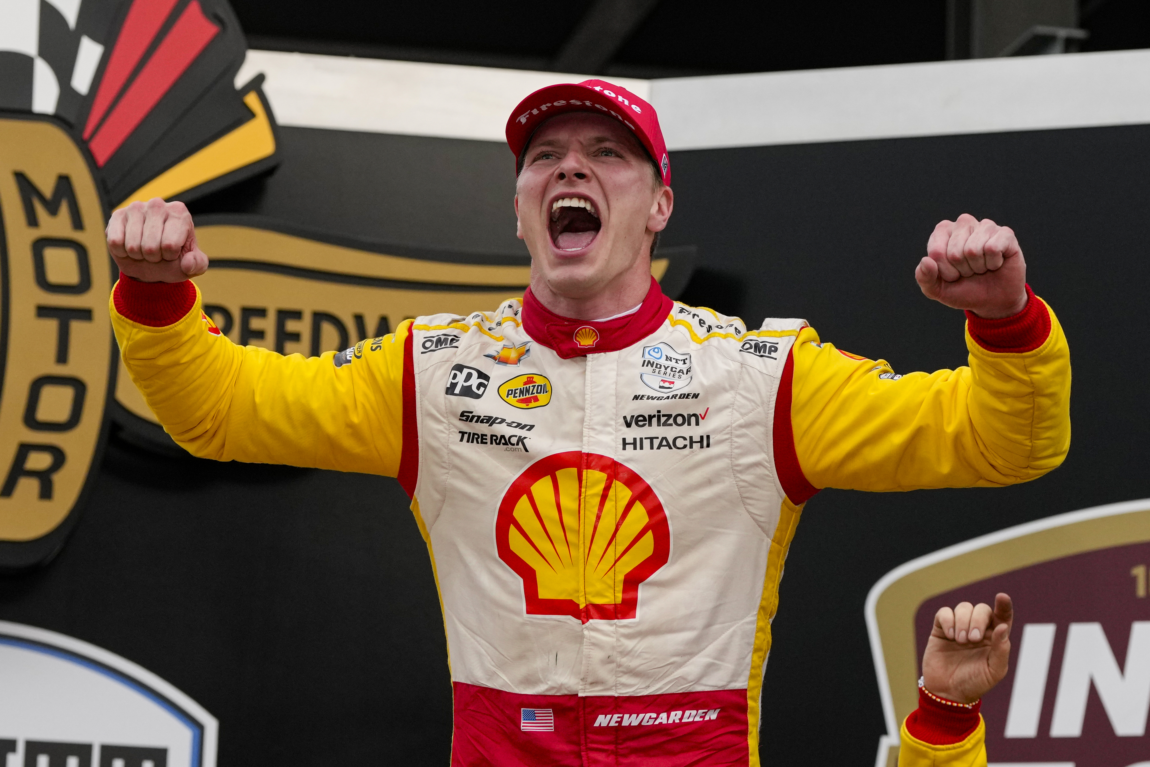 Josef Newgarden celebrates after winning the 108th Indianapolis 500.