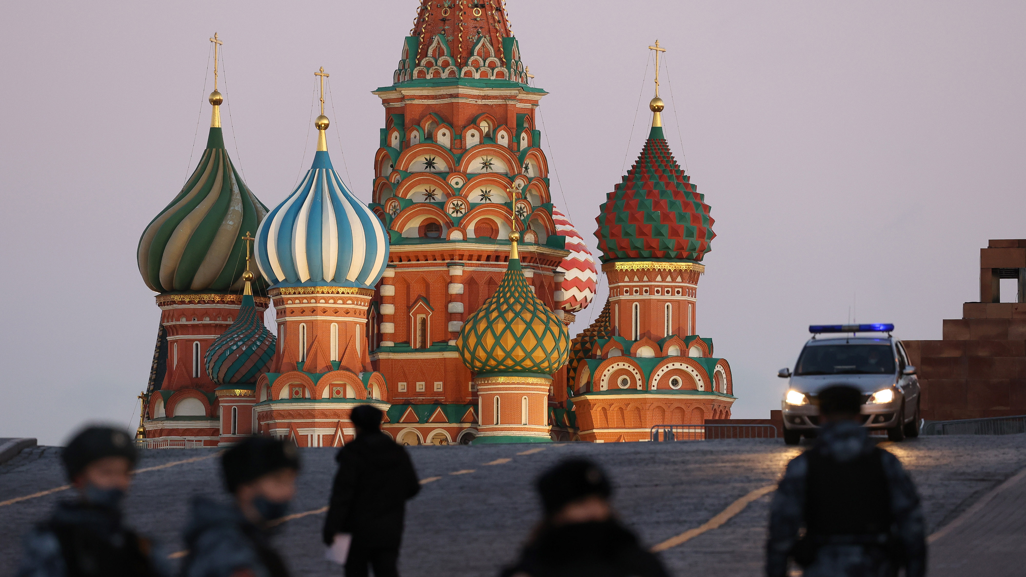 Soldiers from the Russian National Guard patrol the area surrounding Saint Basil's Cathedral on Red square in Moscow, Russia.