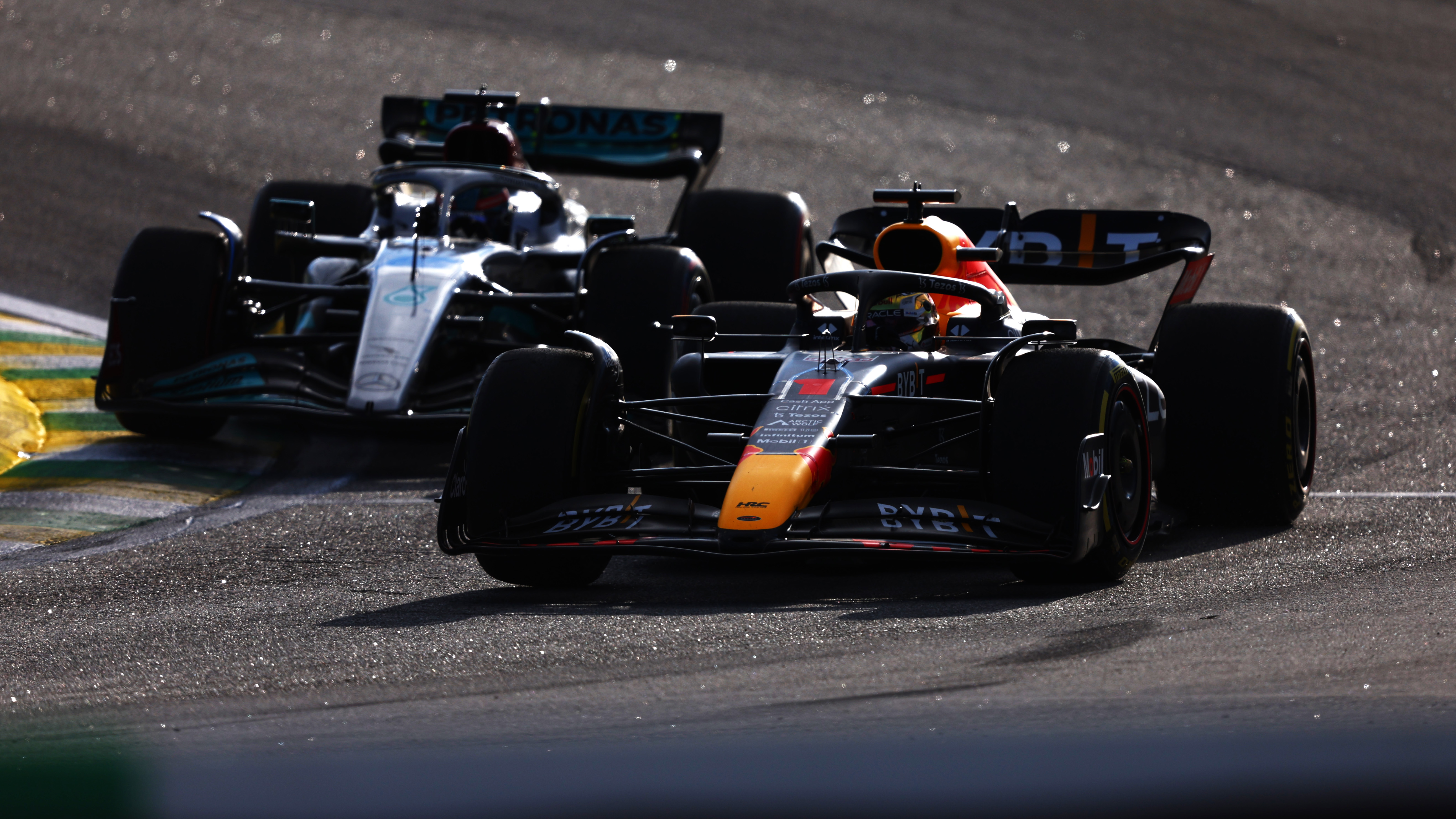 Max Verstappen of the Netherlands driving the (1) Oracle Red Bull Racing RB18 leads George Russell of Great Britain driving the (63) Mercedes AMG Petronas F1 Team W13 on track during the Sprint ahead of the F1 Grand Prix of Brazil at Autodromo Jose Carlos Pace on November 12, 2022 in Sao Paulo, Brazil. (Photo by Bryn Lennon - Formula 1/Formula 1 via Getty Images)