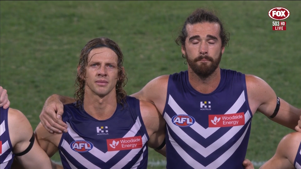 Fremantle players Nat Fyfe and Alex Pearce hold back tears as they pay tribute to their late teammate Cameron McCarthy.