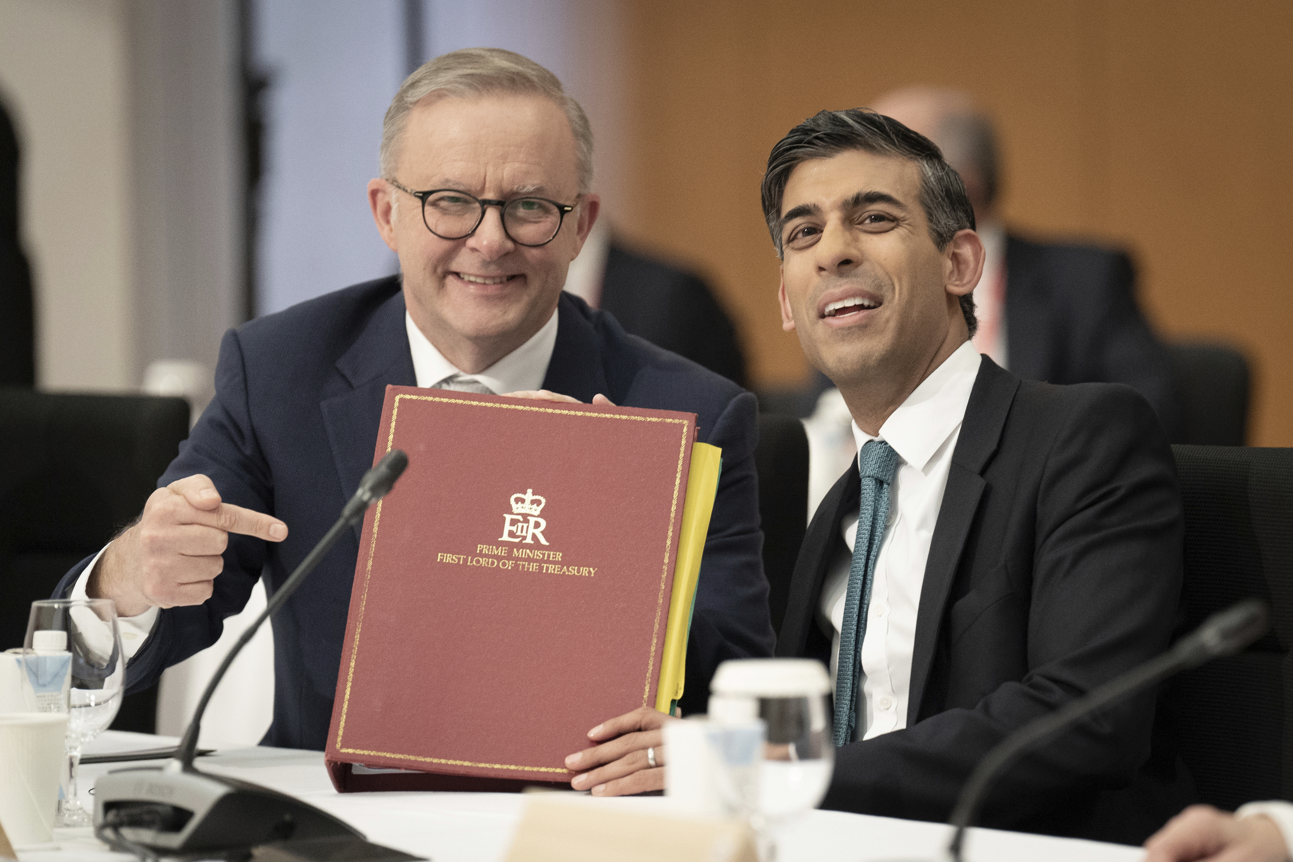 Australian Prime Minister Anthony Albanese (left) sits with Britain's Prime Minister Rishi Sunak during a G7 working session at the G7 Summit in Japan.