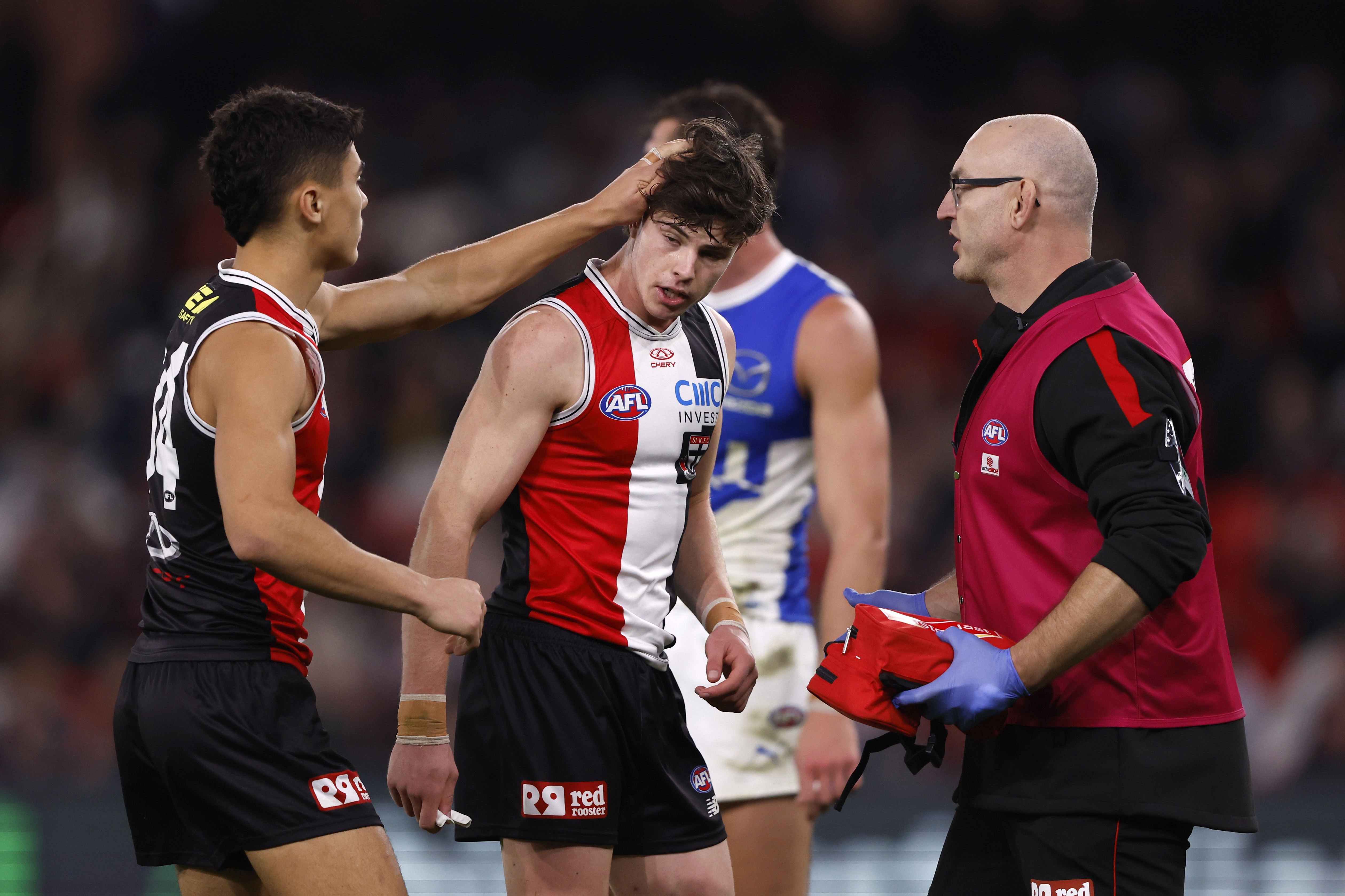 Darcy Wilson stayed on the ground after colliding with Wardlaw.