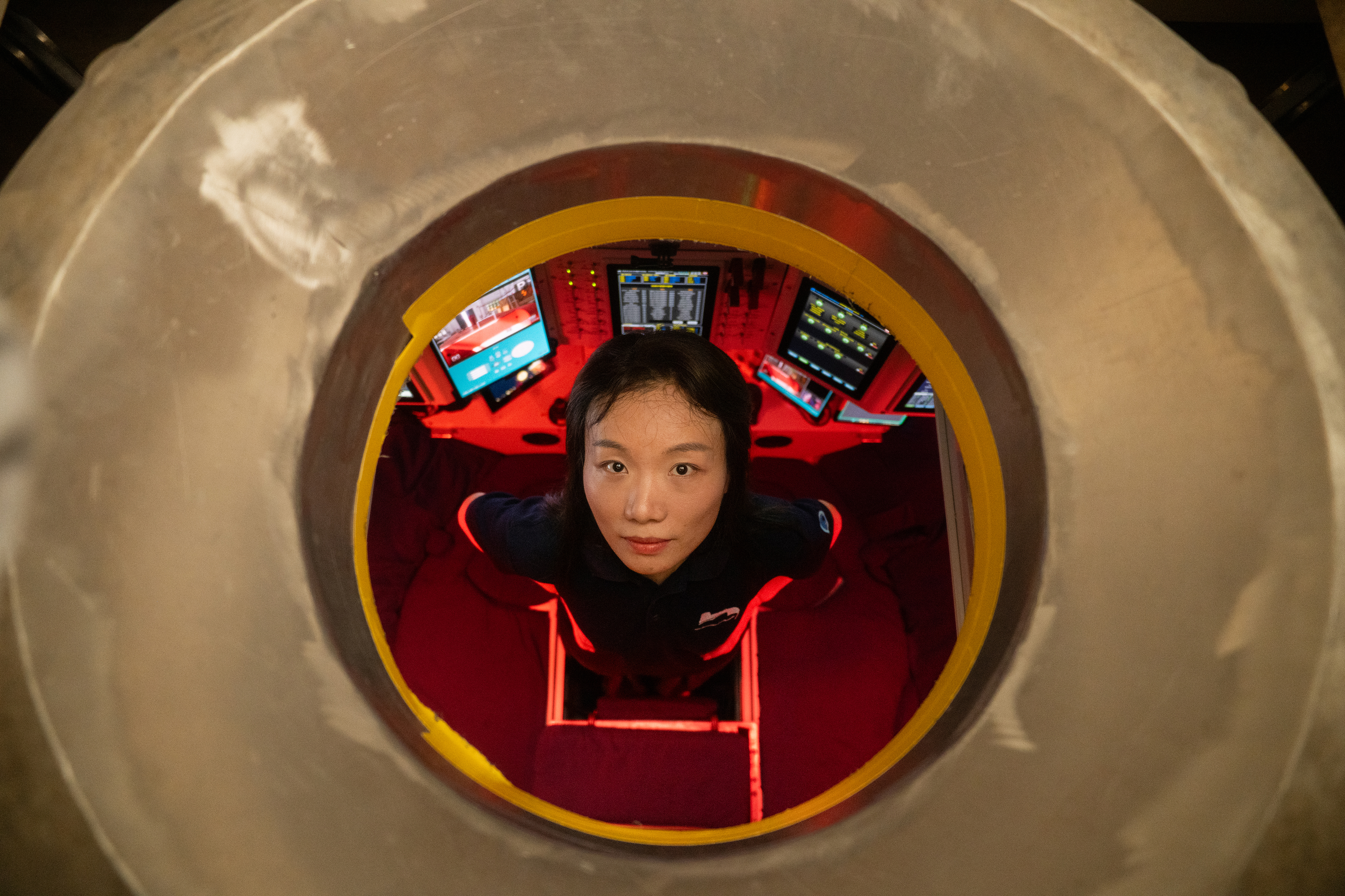 Assistant Professor Mengran Du, posed for photographs inside China's deep-sea manned submersible Fendouzhe, at Sanya Institute of Deep-sea Science and Engineering, in Sanya, China, on 17 Nov 2025.