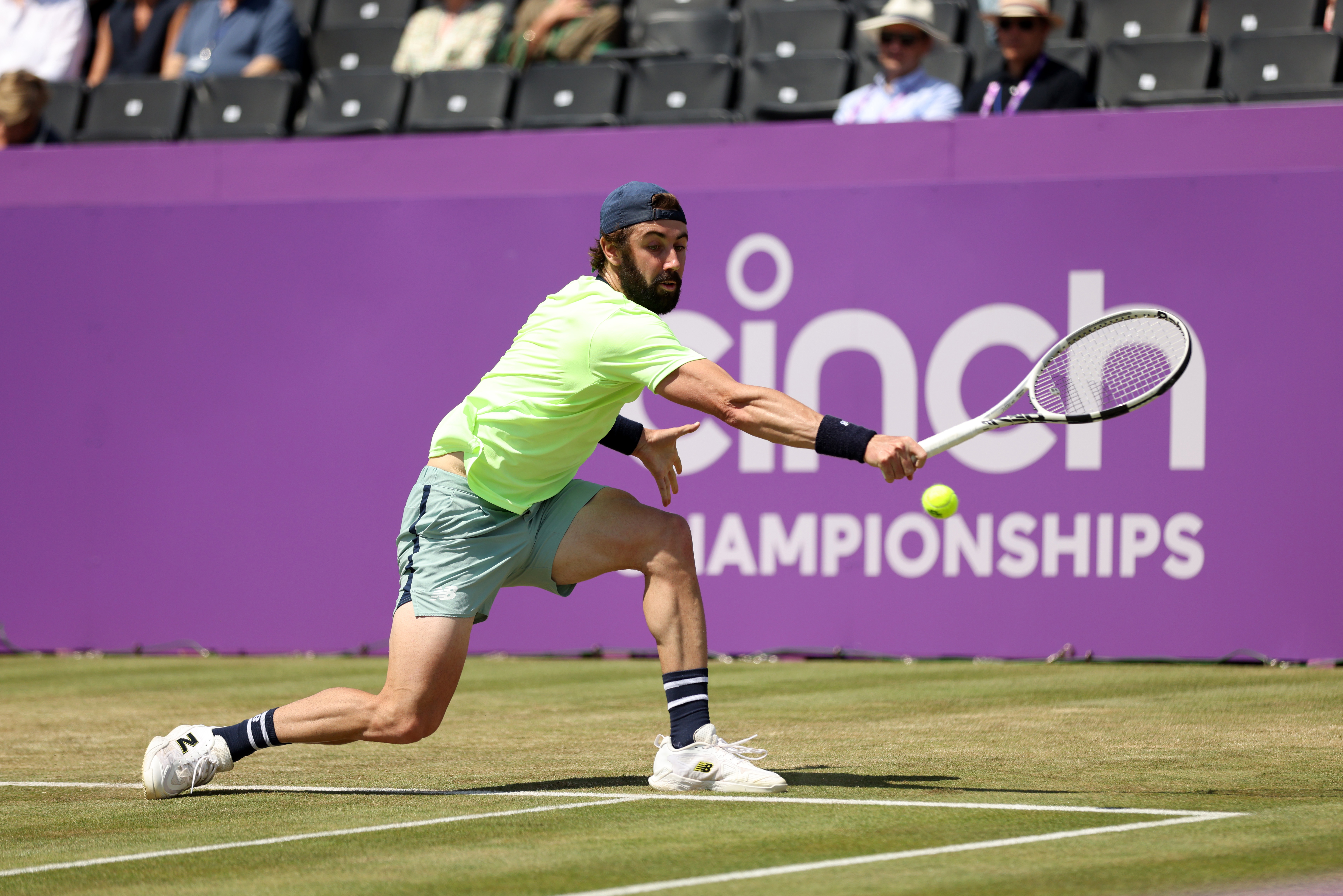 Jordan Thompson of Australia plays a backhand against Taylor Fritz of United States during the Men's Singles Quarter Final match on Day Five of the cinch Championships at The Queen's Club on June 21, 2024 in London, England.  (Photo by Luke Walker/Getty Images for LTA)