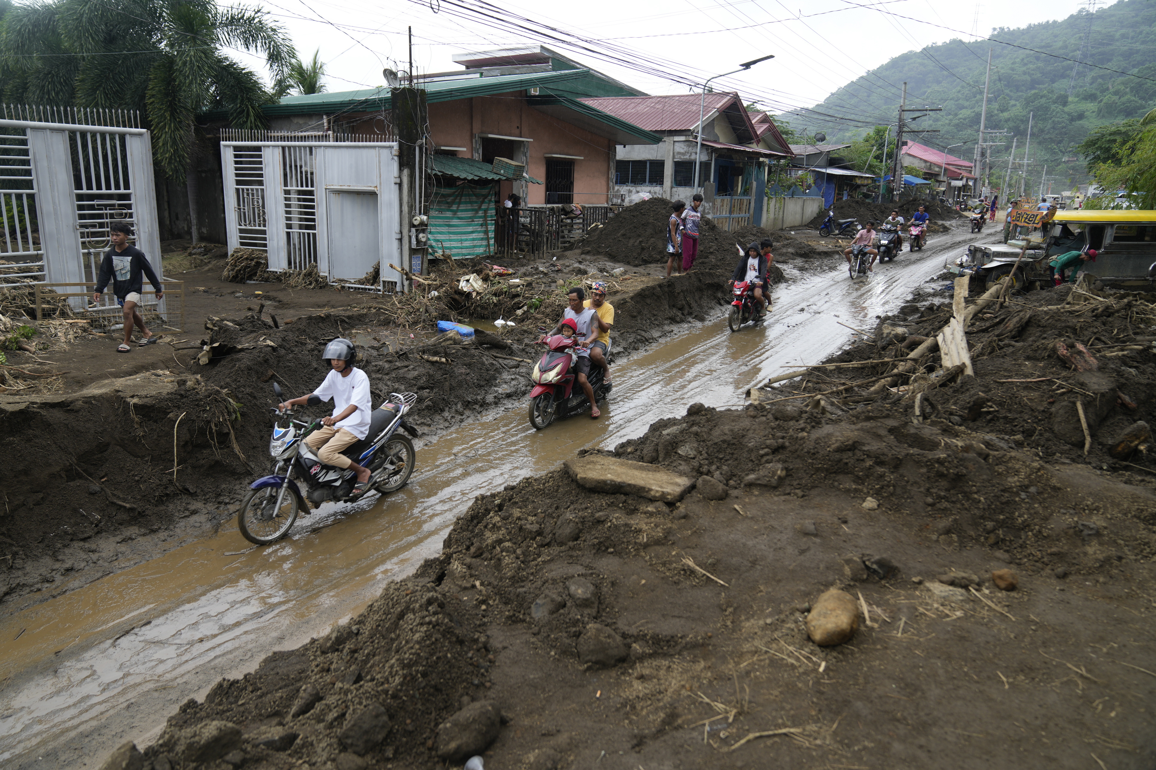 Tropical Storm Trami struck homes in Talisay, Batangas province, Philippines