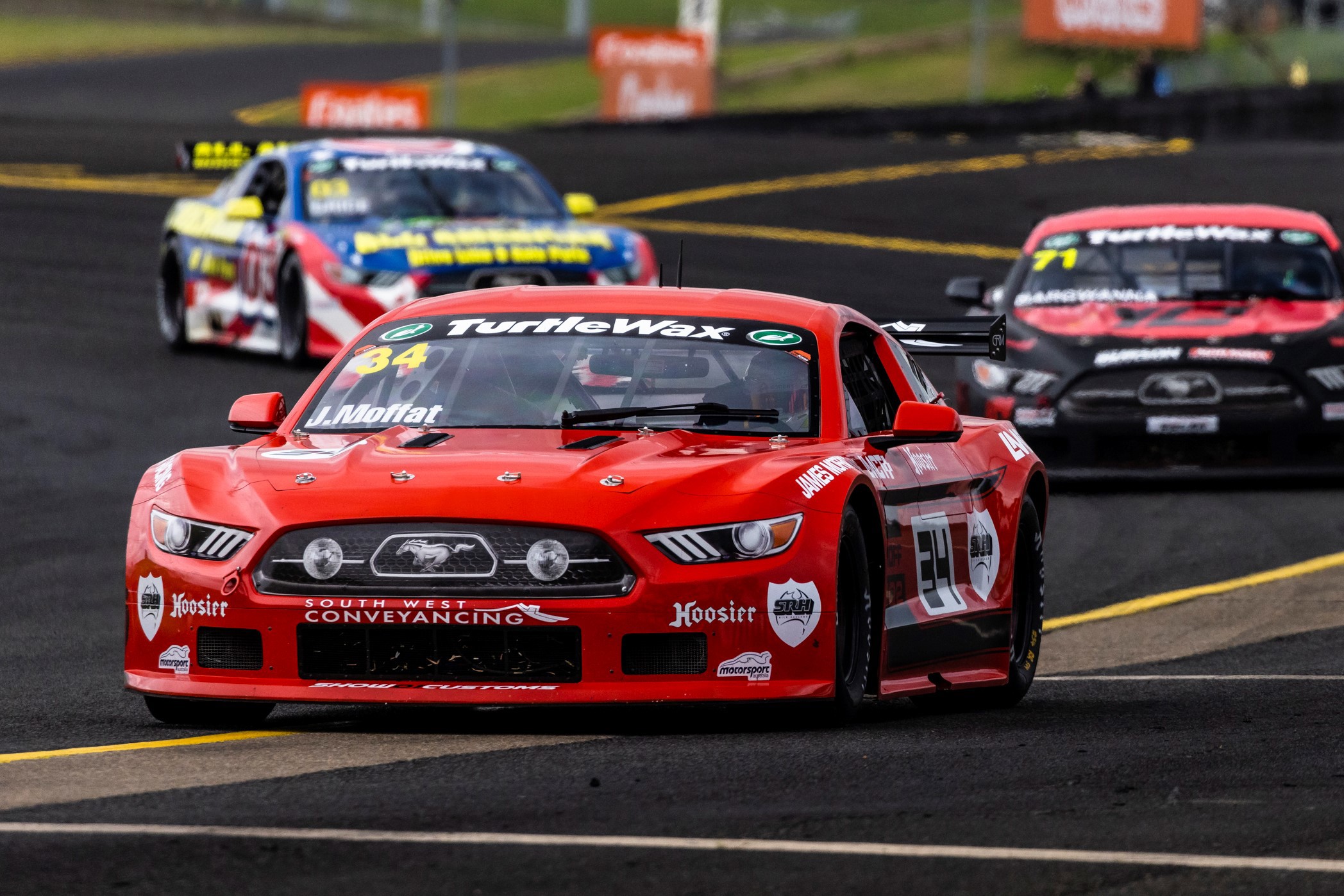 James Moffat drove a Ford Mustang with a livery inspired by his father's iconic 1969 Ford Mustang back by Coca-Cola.