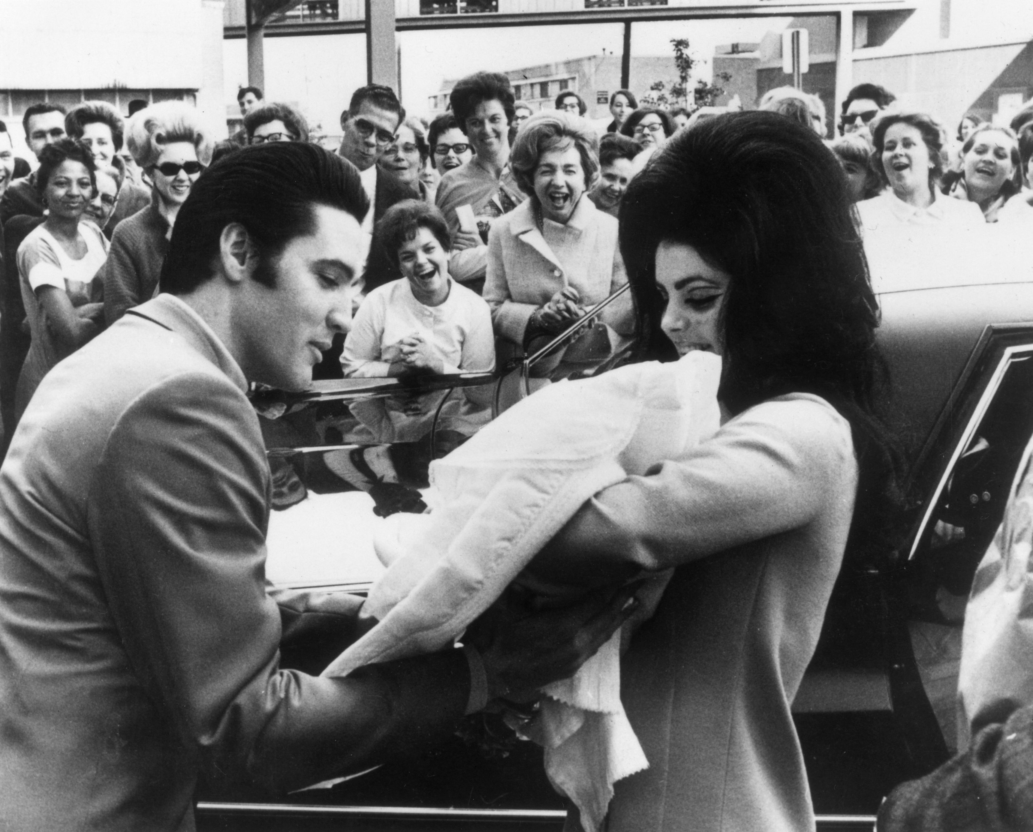 Elvis Presley with Priscilla and daughter Lisa Marie
