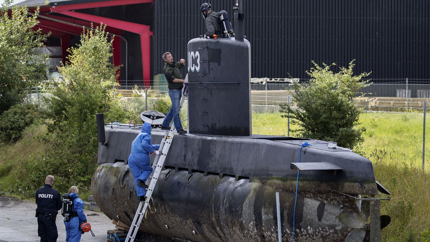 Police investigate Peter Madsen's submarine. Photo: AAP