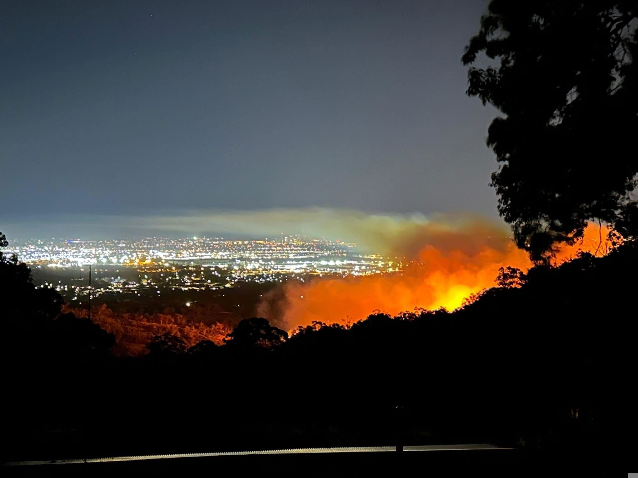 More than 2000 homes lost power and scores were endangered by the fierce inferno.
