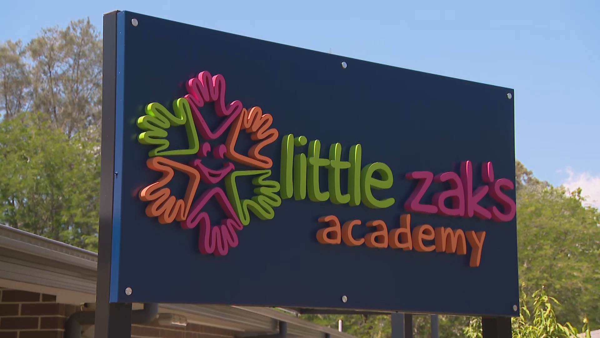 A sign of Little Zak's Academy, a childcare centre in Doonside. 