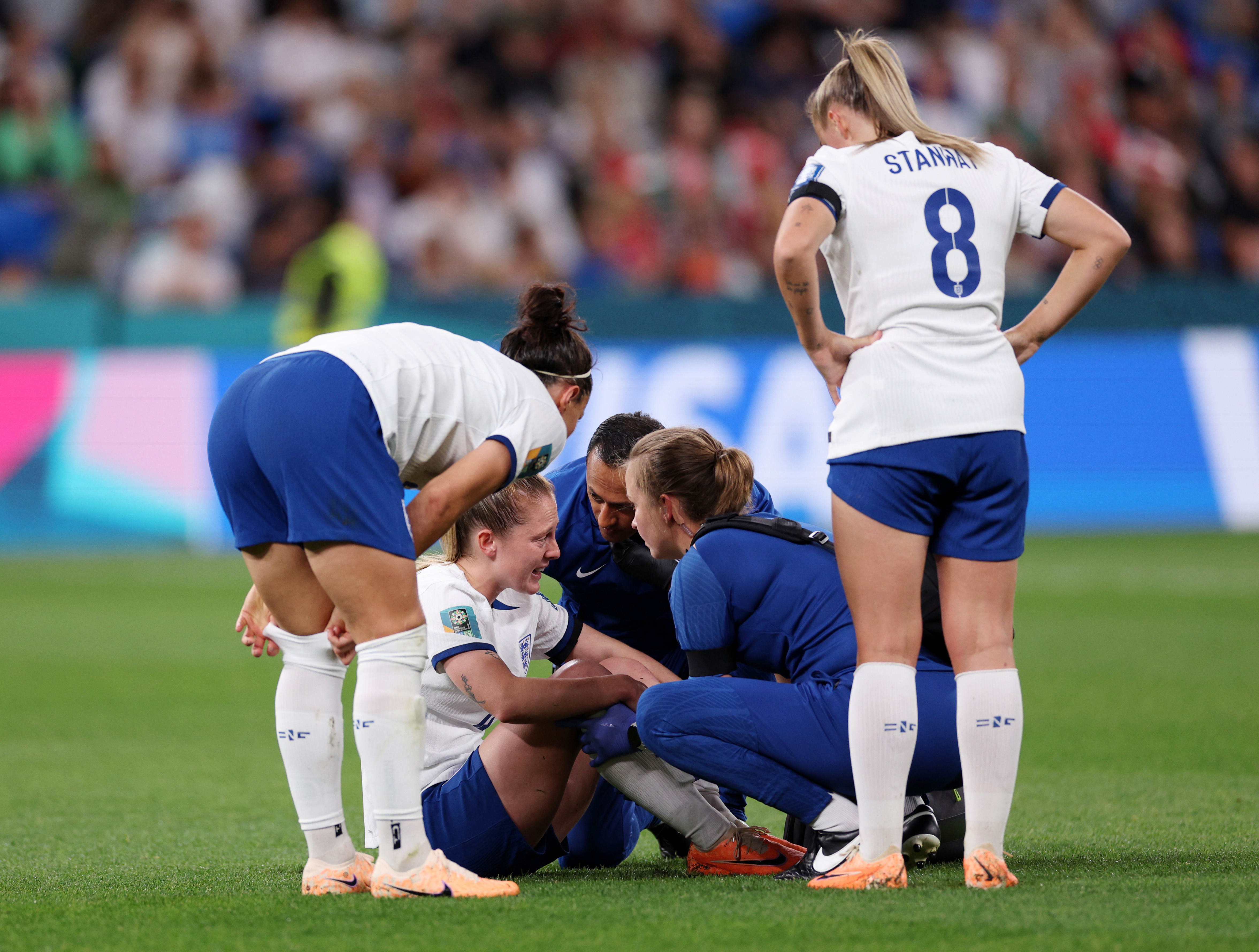 Keira Walsh of England receives medical attention during the FIFA Women's World Cup Australia & New Zealand 2023 Group D match between England and Denmark at Sydney Football Stadium on July 28, 2023 in Sydney / Gadigal, Australia. (Photo by Elsa - FIFA/FIFA via Getty Images)