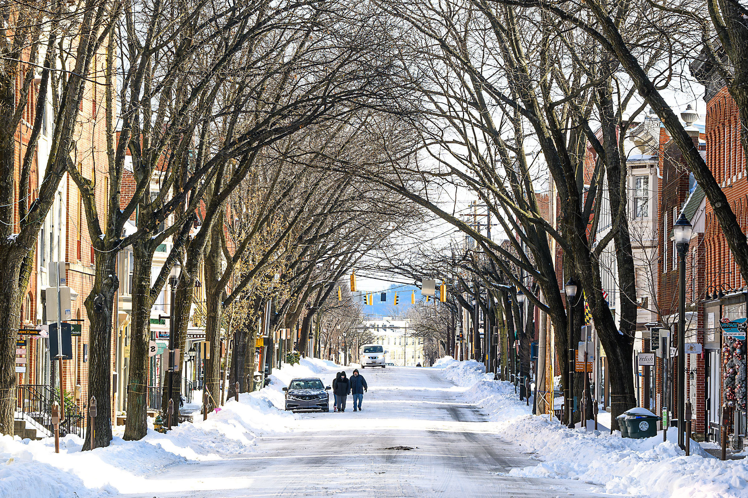 A roads sits almost empty in downtown Frederick, Md. Monday, Jan. 26, 2026, after a snowstorm that dumped approximately 10 inches of snow. (Ric Dugan/The Frederick News-Post via AP)