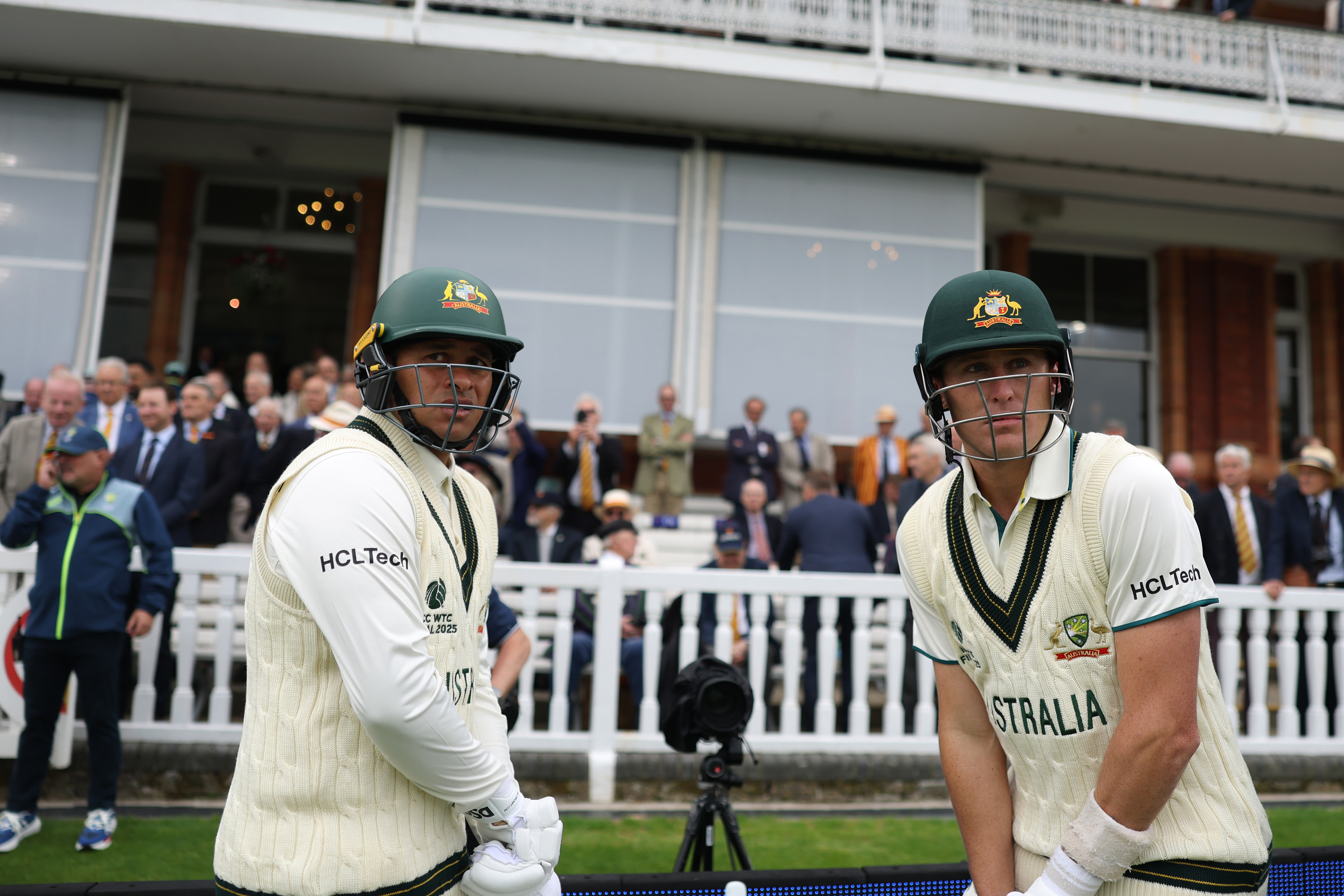 LONDON, ENGLAND - JUNE 11: Marnus Labuschagne and Usman Khawaja of Australia walk out to bat during Day One of the ICC World Test Championship Final 2025 between South Africa and Australia at Lord's Cricket Ground on June 11, 2025 in London, England. (Photo by Alex Davidson-ICC/ICC via Getty Images)