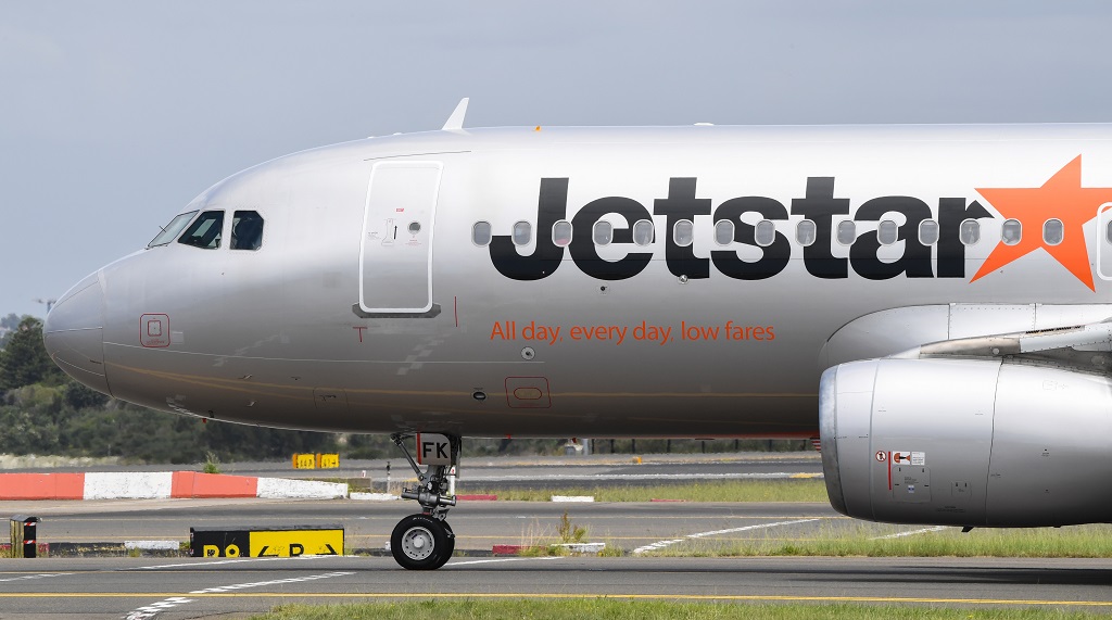 Jetstar plane on tarmac.