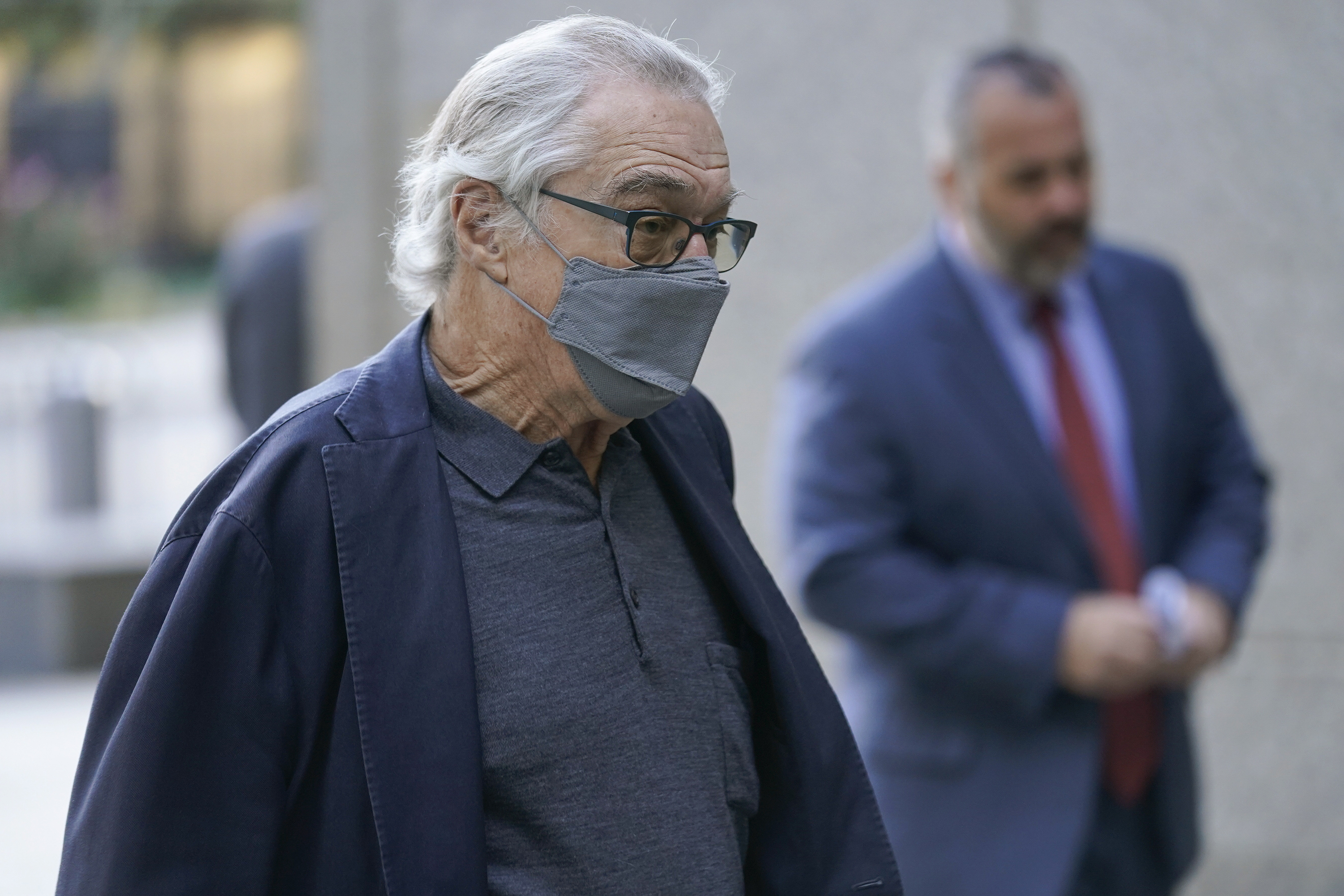 Actor Robert De Niro arrives to court in New York, Tuesday, Oct. 31, 2023.  De Niro continues his testimony in a $12 million lawsuit accusing him of being a bad boss. The 80-year-old actor is being sued by a former assistant, Graham Chase Robinson. De Niro is also suing Robinson, accusing her of charging personal expenses to his company.  (AP Photo/Seth Wenig)