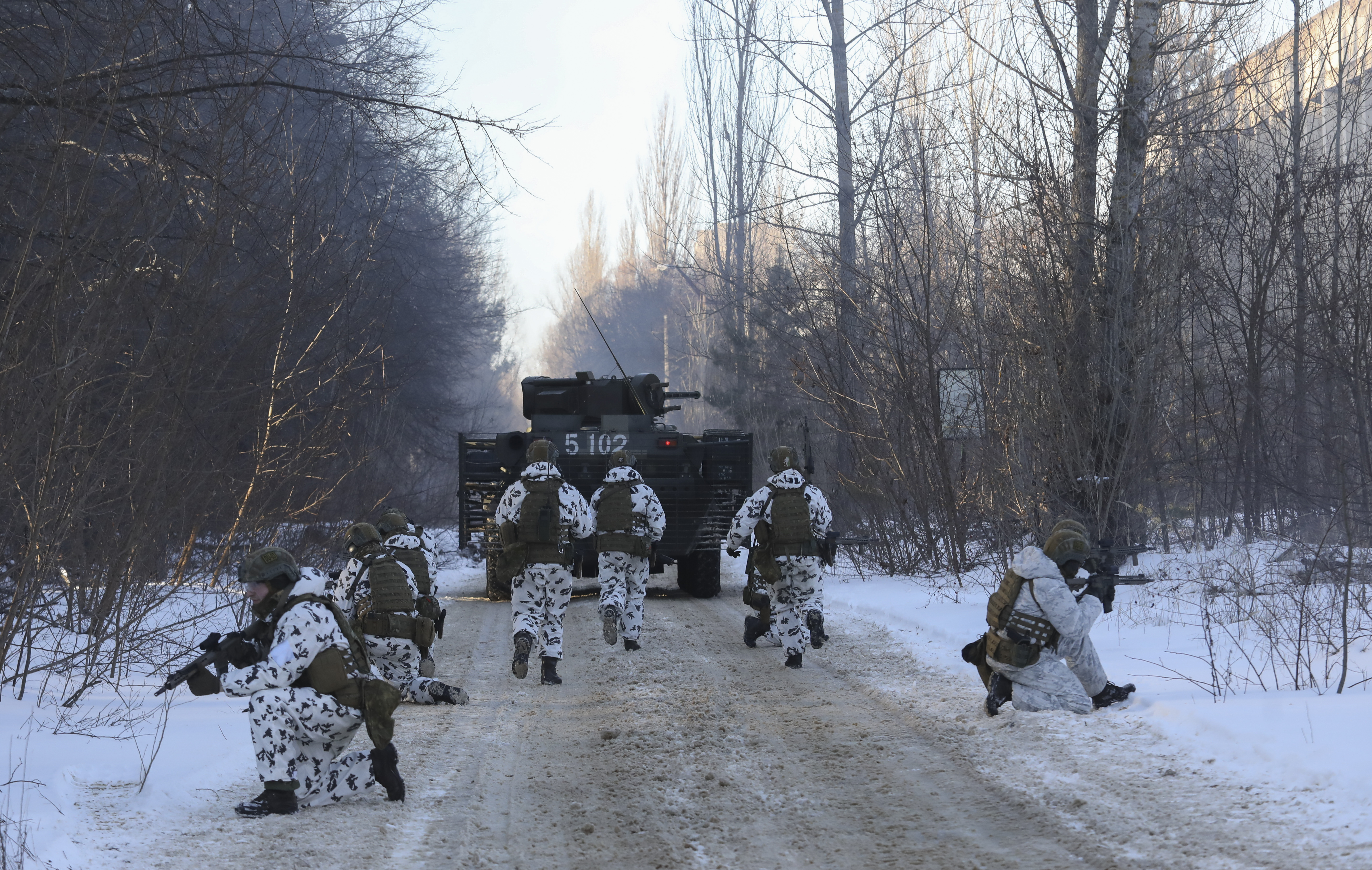 Ukrainian National Guard, Armed Forces, special operations units exercise as they simulate a crisis situation in an urban settlement, in the abandoned city of Pripyat near the Chernobyl Nuclear Power Plant. (AP Photo/Mykola Tymchenko)