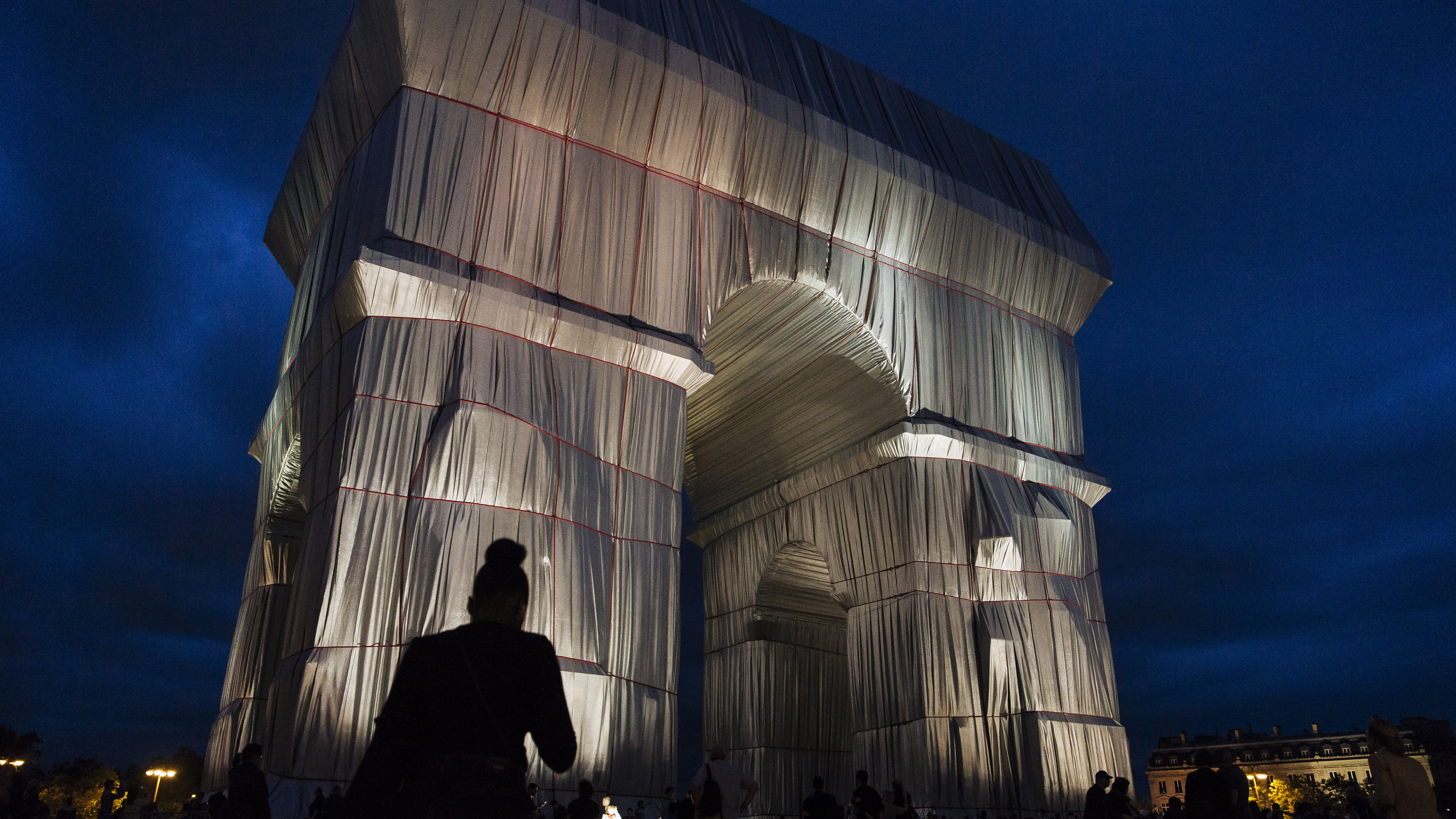 People can see the gleaming silver and blue fabric and touch it too as the artists had intended. 
