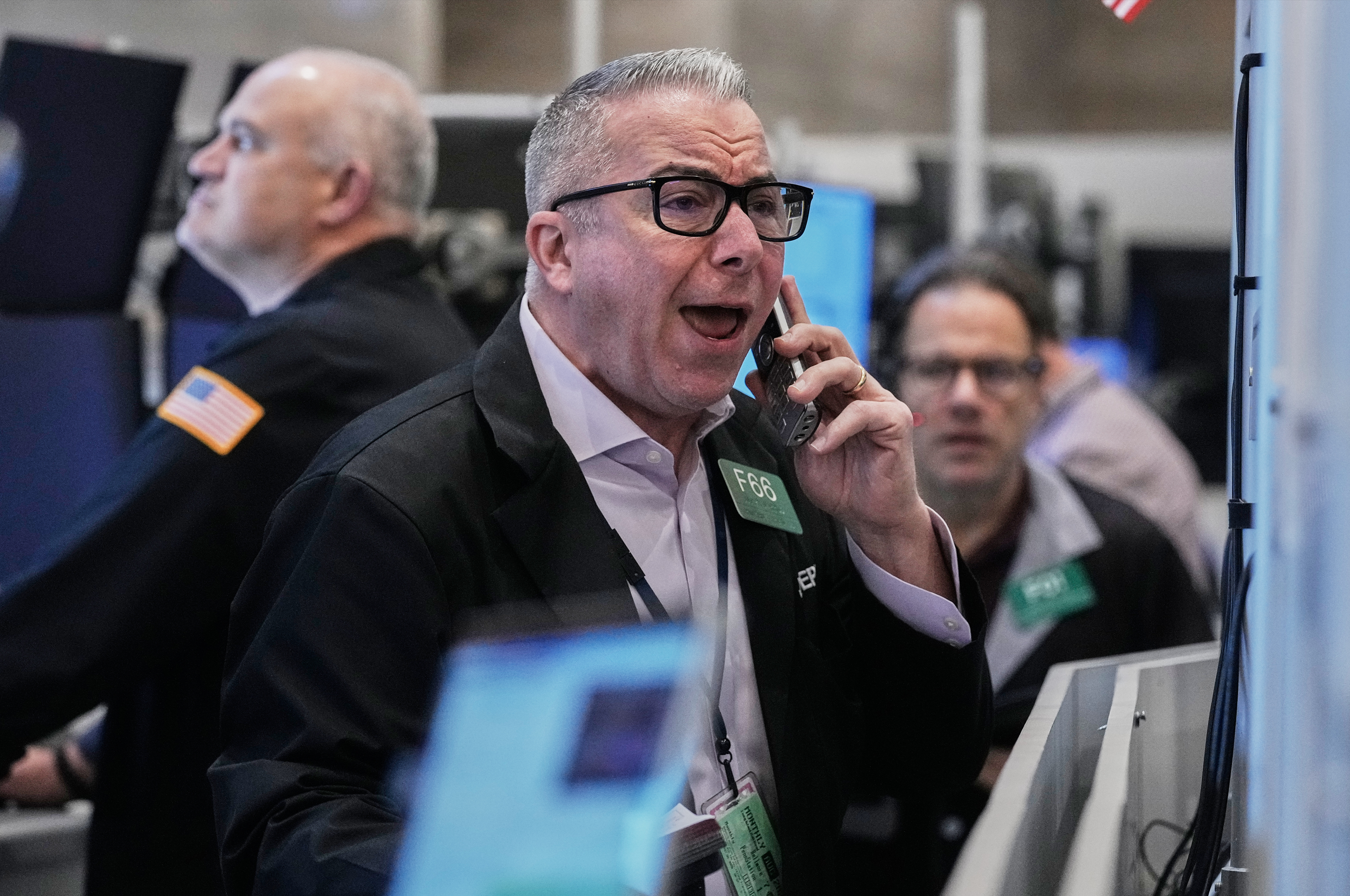 Options trader Joseph D'Arrigo works on the floor of the New York Stock Exchange, Tuesday, Nov. 18, 2025. (AP Photo/Richard Drew)